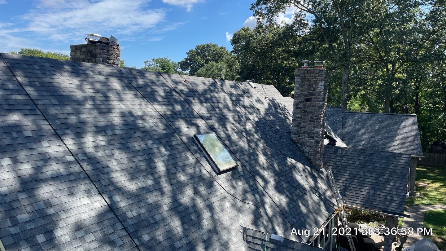 Roof Replacement using IKO Dynasty by American Home Contractors