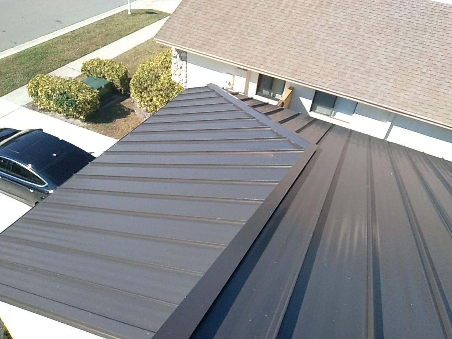 Residential Roofing Installation using 1" Nail strip metal roof by BLUES BROTHERS ROOFING