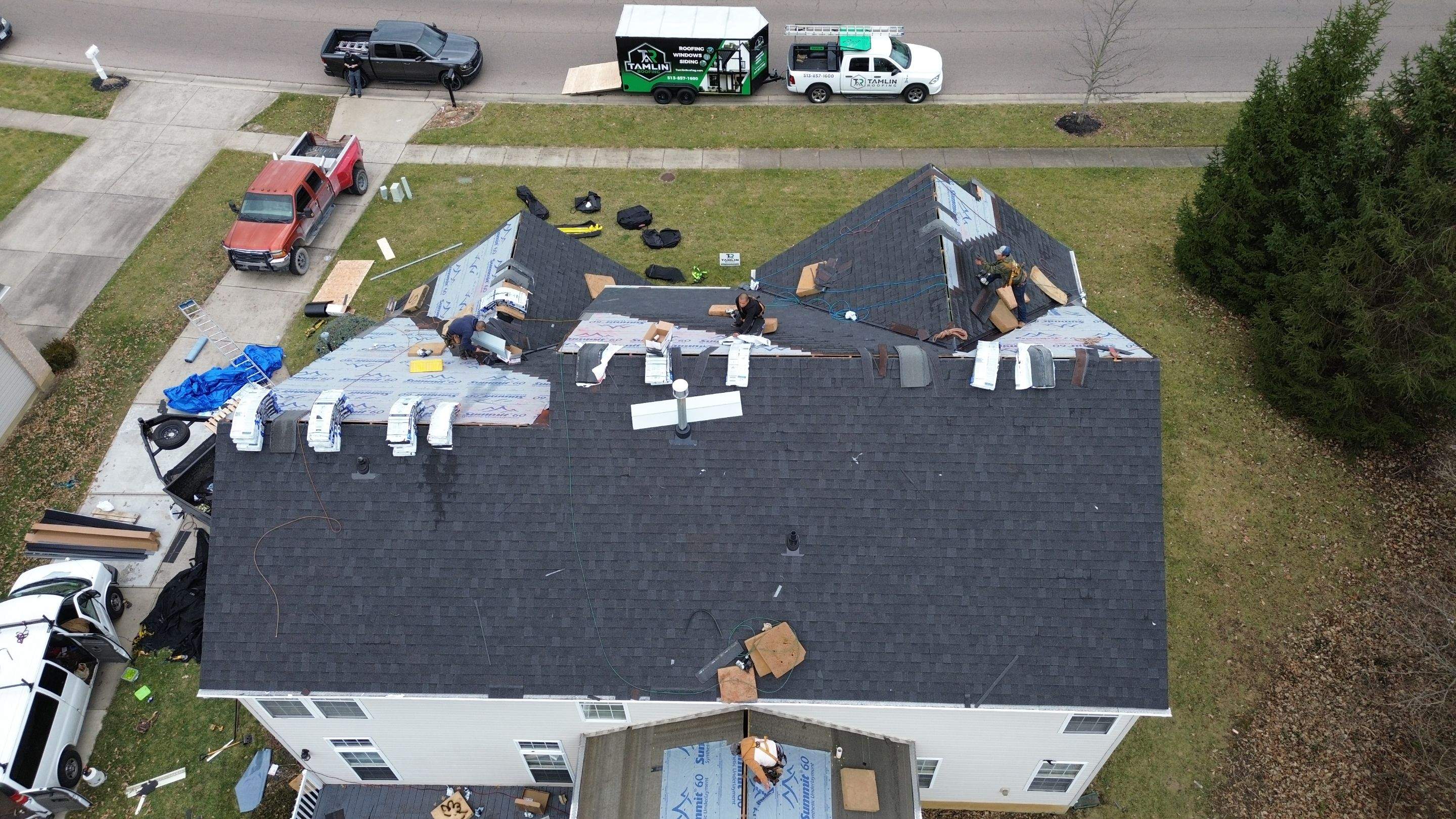 Walden Ponds - Pristine Black and Hydro Flo Gutter Guards by Tamlin Roofing