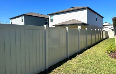 Vinyl Fence Installation using 6ft Tan Vinyl Privacy Fence