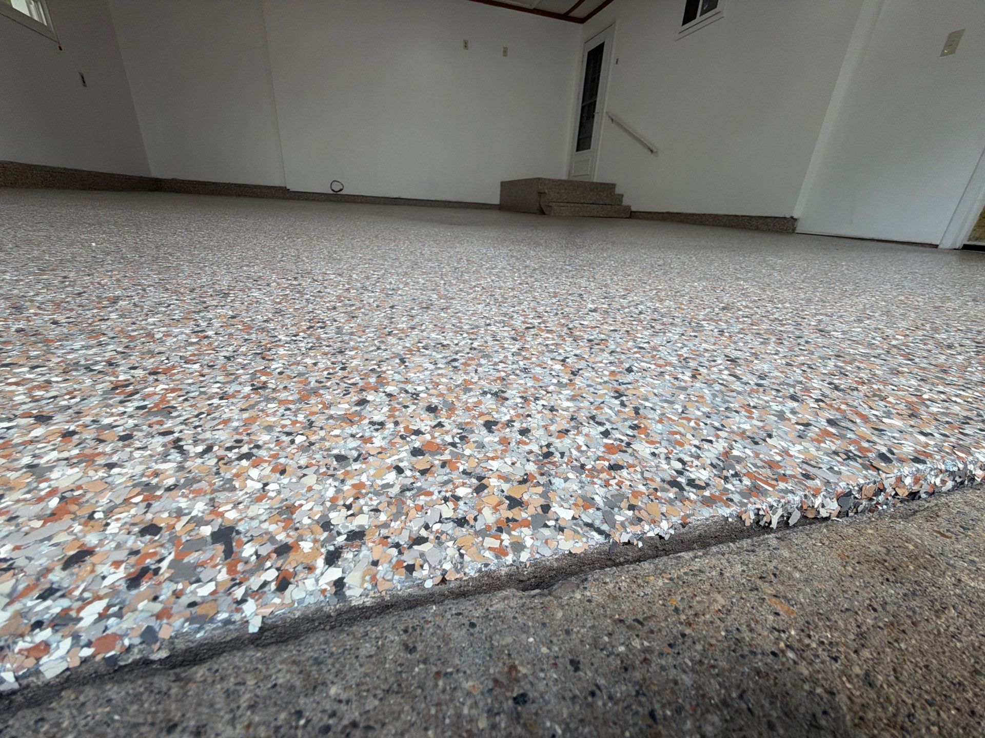 Multi-Colored Epoxy Flake Garage Floor Installation in Fruitport by Gordon Painting
