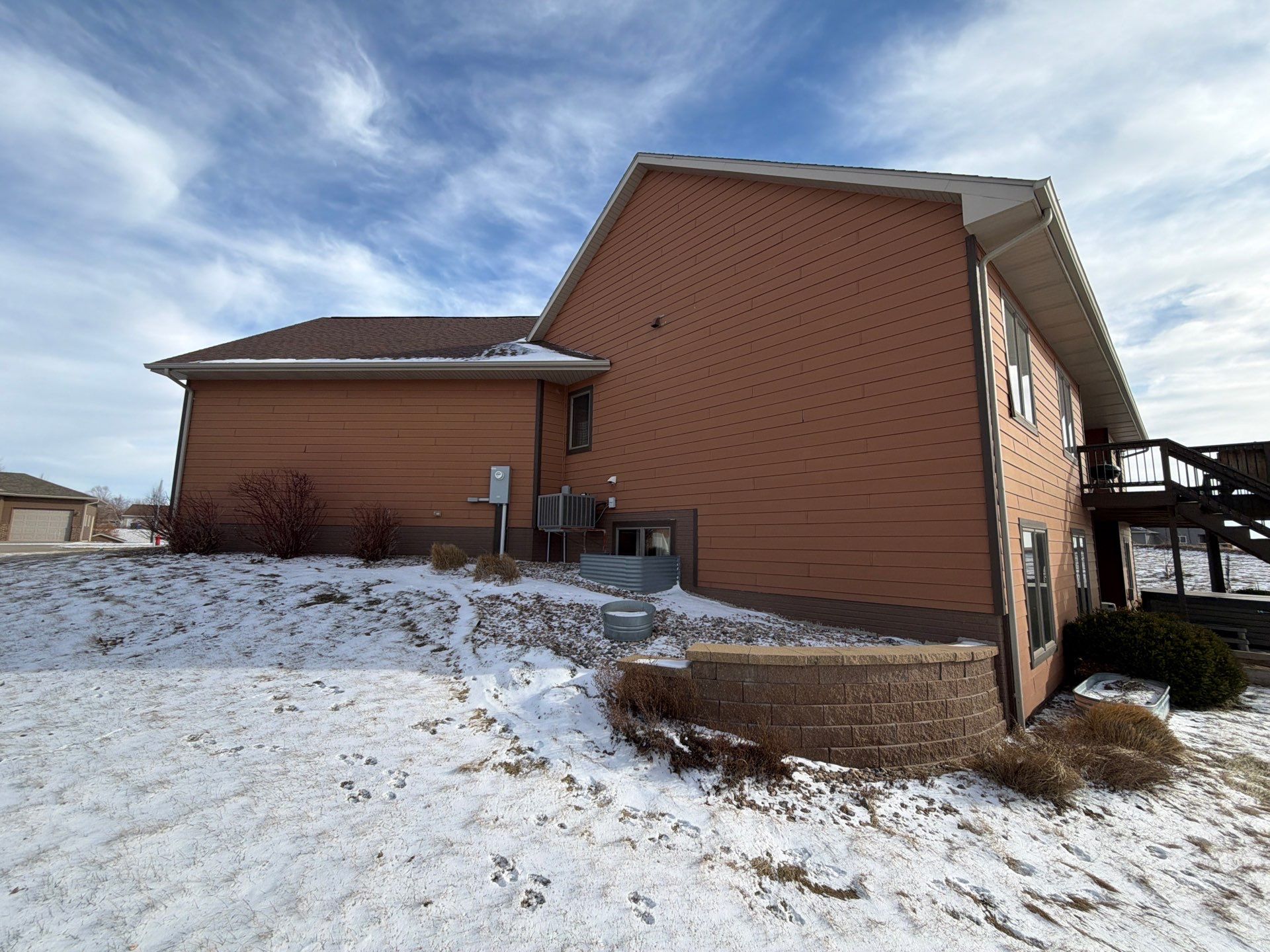 Residential Exterior Painting and Siding Restoration in Crooks by Select Painting, Coatings & Garage Cabinets