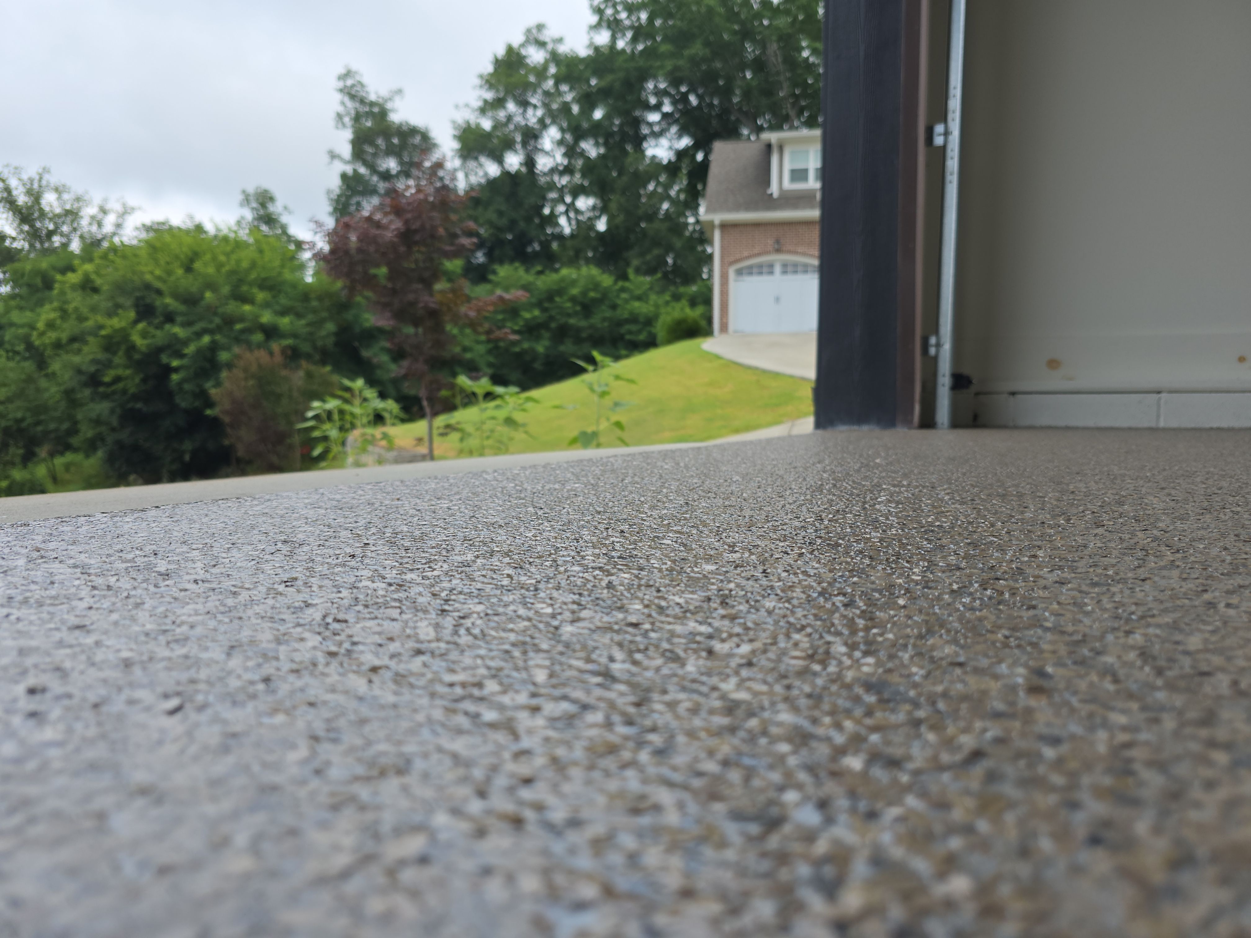 Front Porch and Garage using Obsidian by Elite Floor Solutions