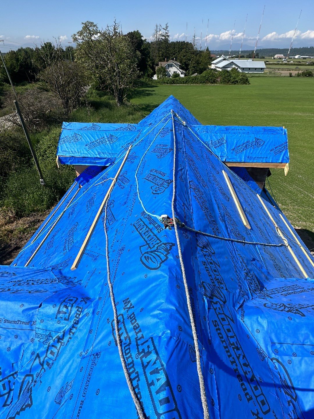 Agricultural Roofing Installation using 12" Prolok metal  by Top Notch Roofing Inc
