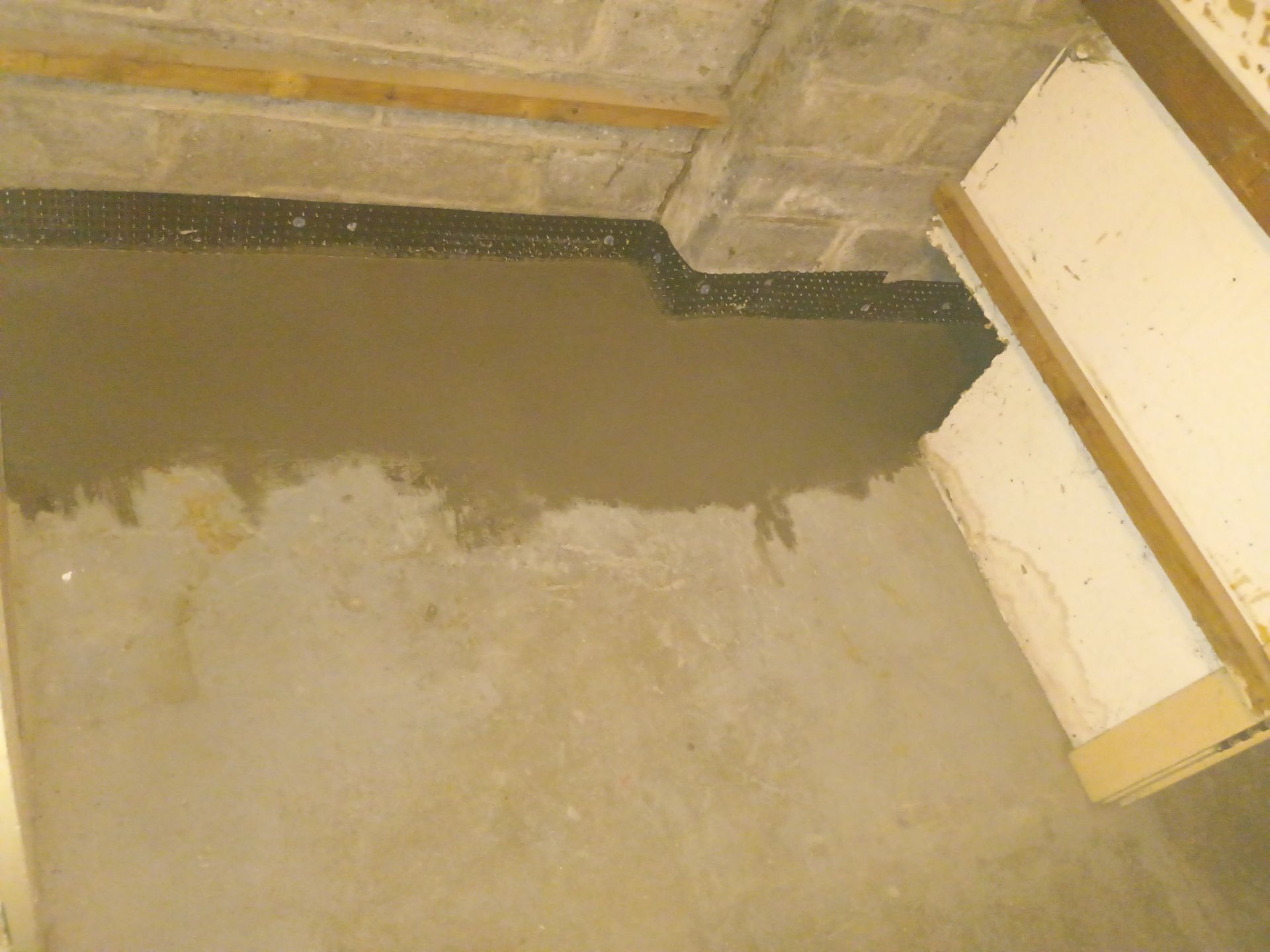 Interior Drain Tile for a South Minneapolis Basement by Waterproofing Northeast