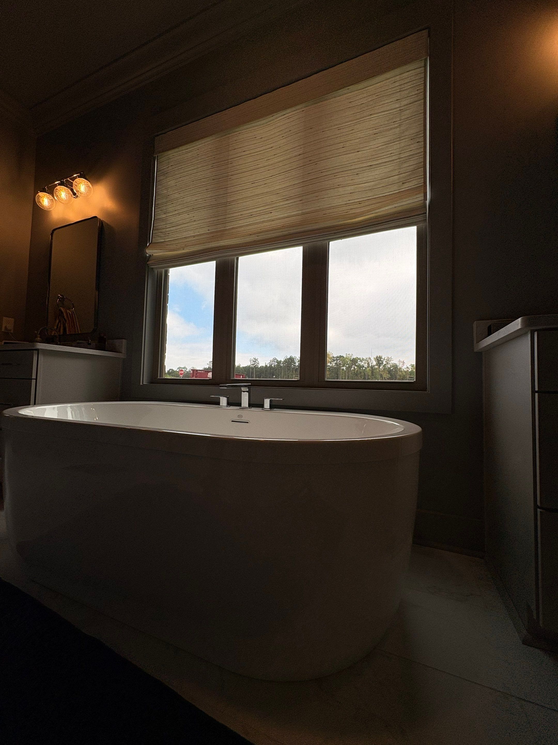 Roman and Woven Wood Shades Project in Huntsville by Blinds and Borders