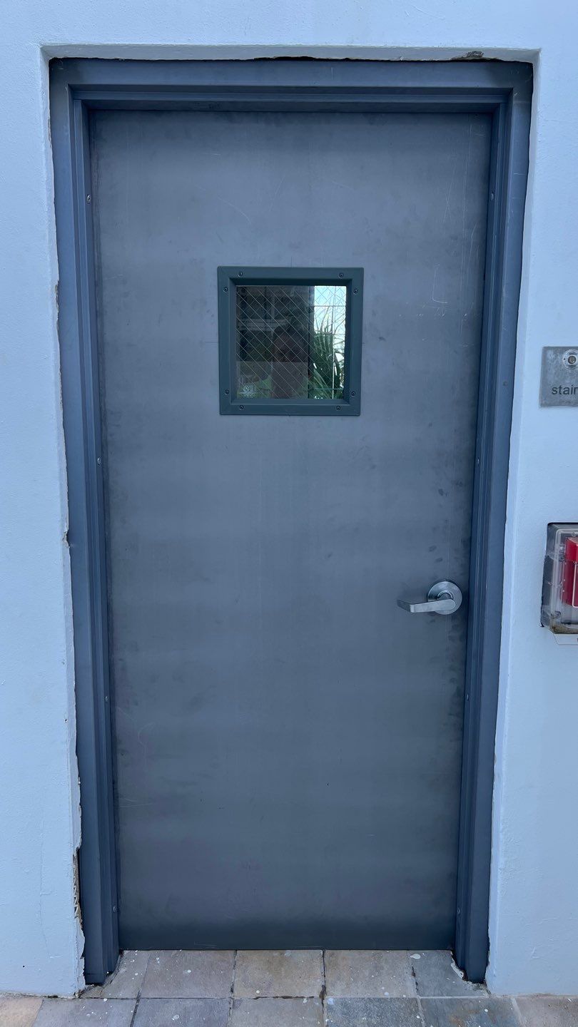 Commercial Stairwell Door Replacement & Hollow Metal Door Retrofit – Pompano Beach High-Rise by The Door Doctor of South Florida, Inc.