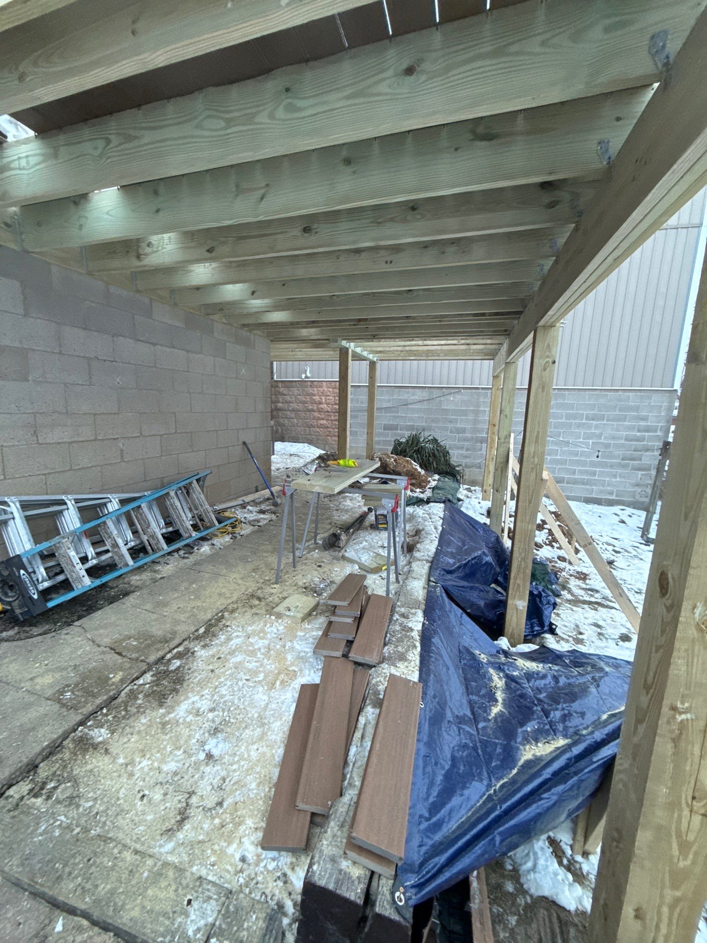 Deck and door by Cousins Roofing Siding & Decks
