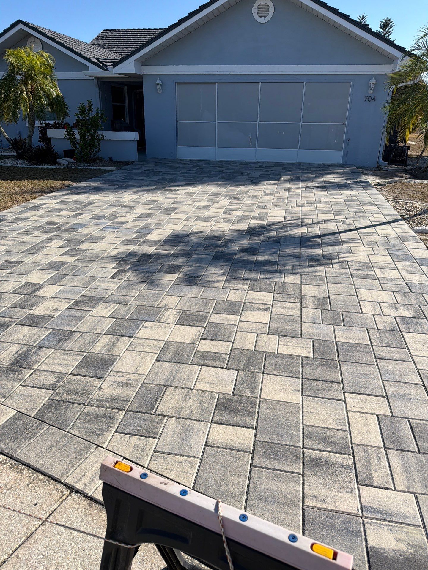 Multi-Tone Gray Paver Driveway Sealing in Sun City Center by Supreme Paver Experts