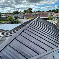 24ga 1.5" Mechanical Seam Dark Bronze by Total Roofing System The Metal Roof Experts
