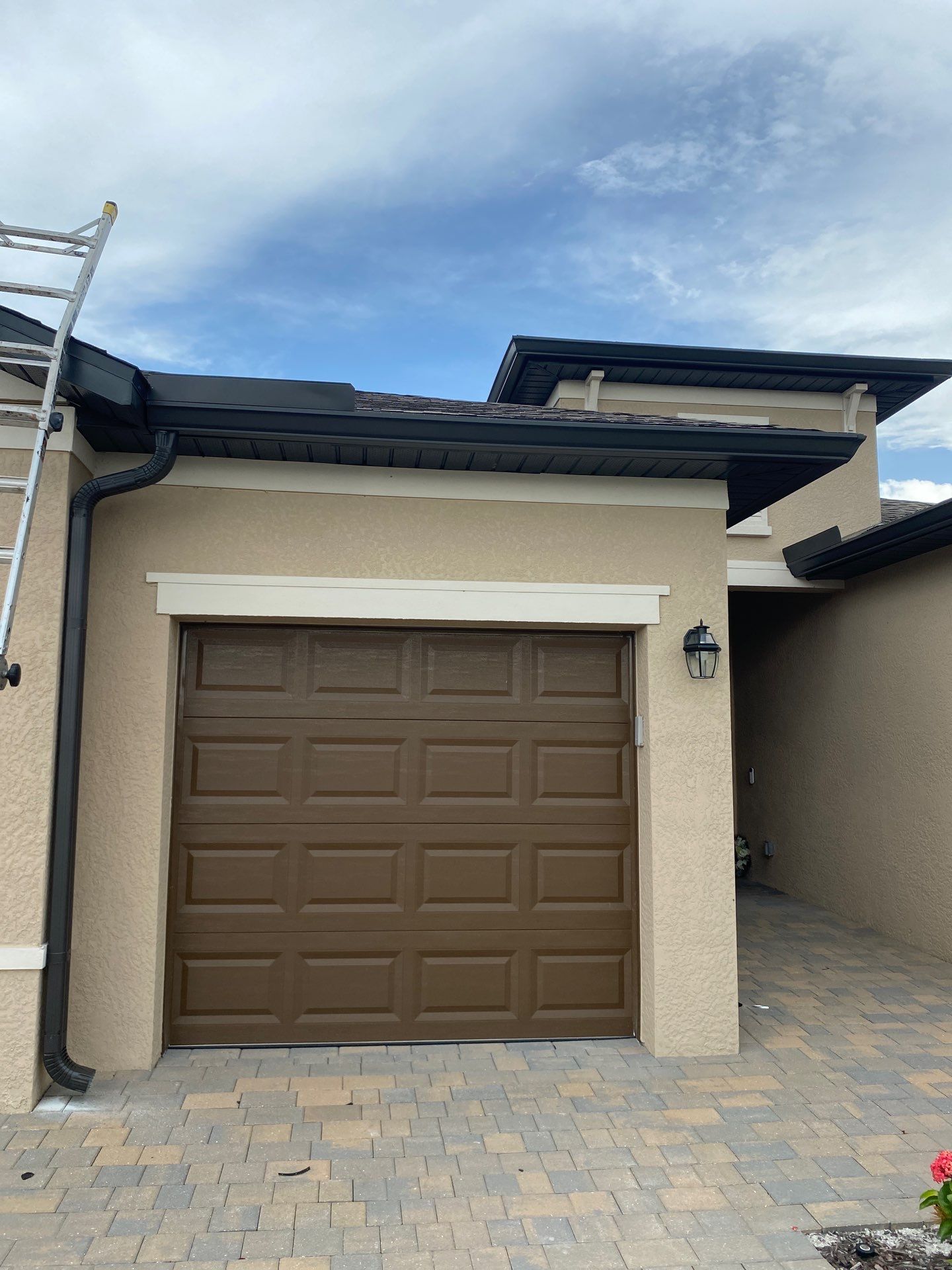 Brown Seamless Gutters for Homes in Fort Myers by Gutter Professors