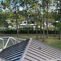 24ga 1.5" Mechanical Seam Dark Bronze by Total Roofing System The Metal Roof Experts