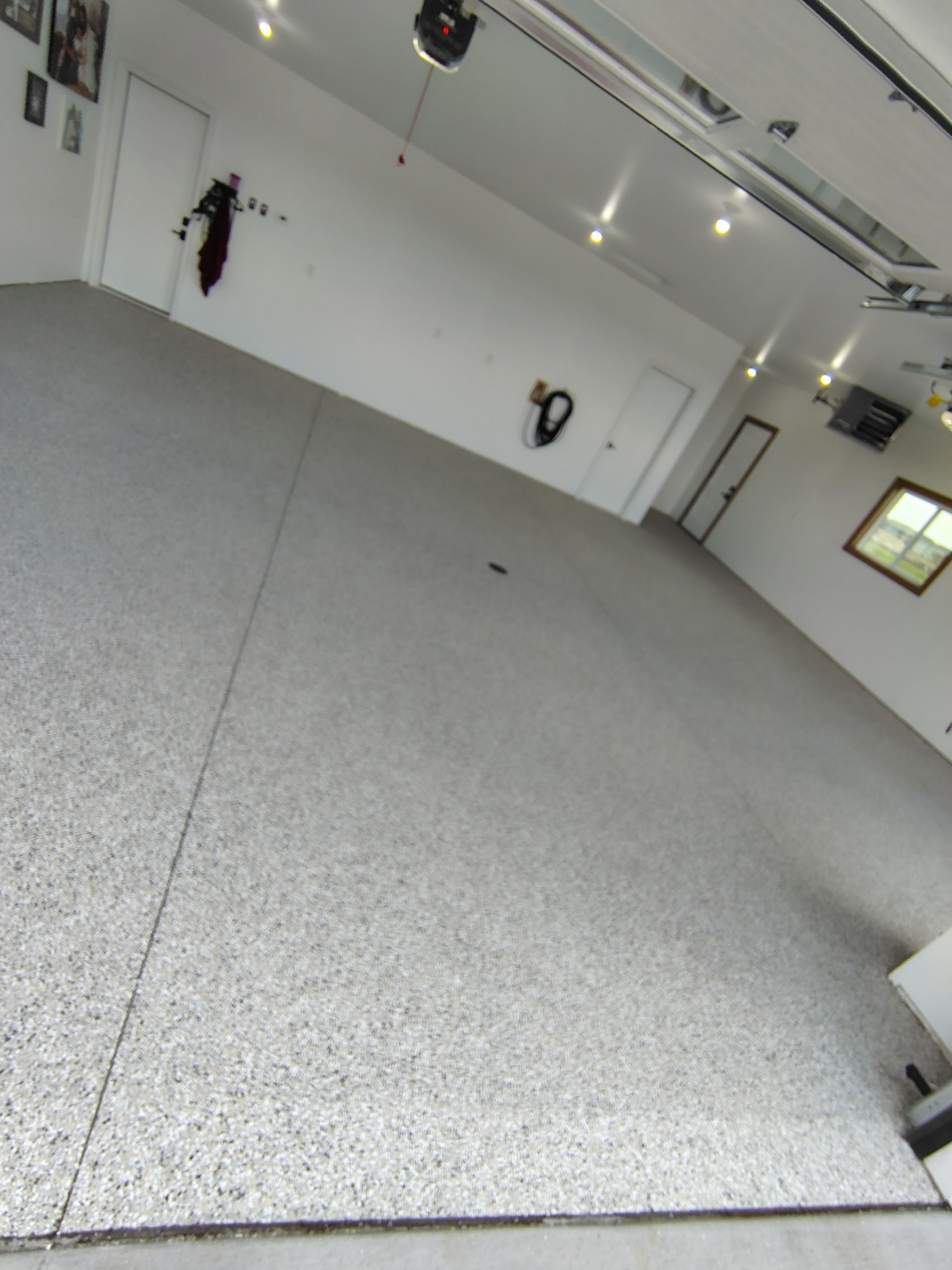 Gray and White Speckled Epoxy Garage Floor Coating in Tea by Select Painting, Coatings & Garage Cabinets