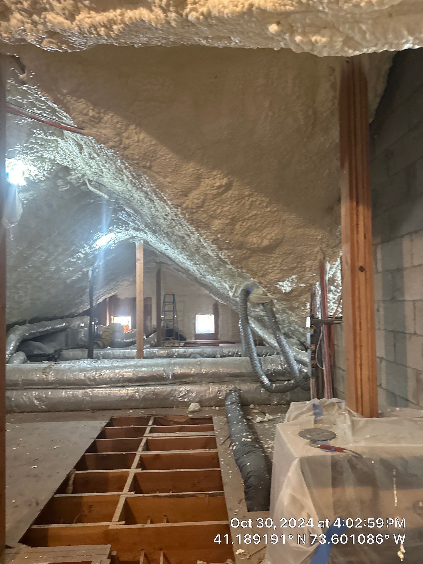 Attic Insulation using open cell spray foam by NYS Foam & Energy