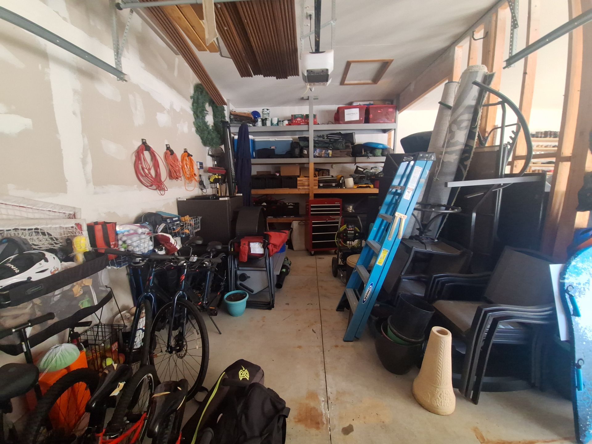 Custom Epoxy Flake Floor and Garage Wall Renovation in Ada by Gordon Painting
