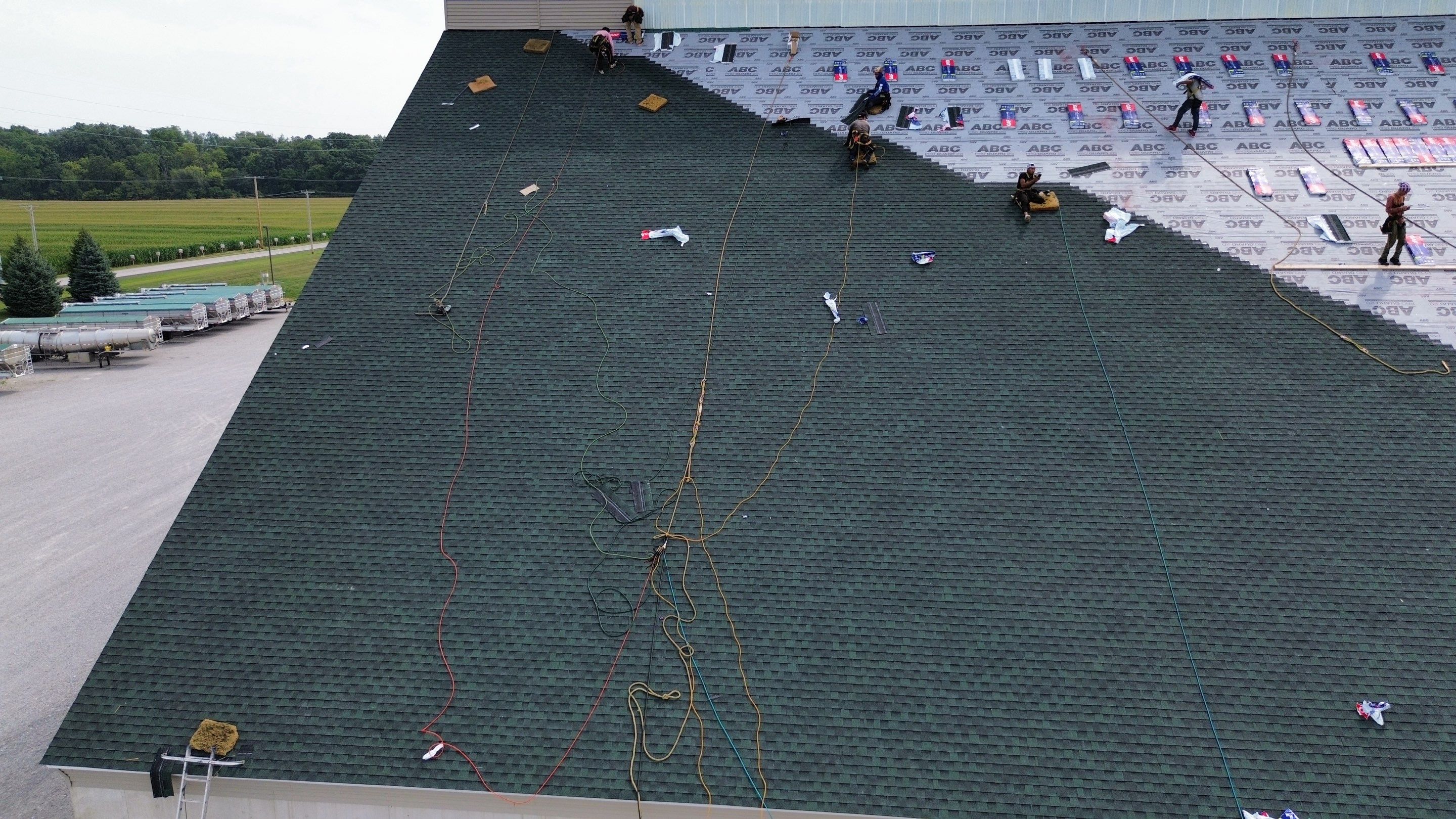 Commercial Roofing Installation using Timberline HDZ Shingles - Hunter Green by RoofX 