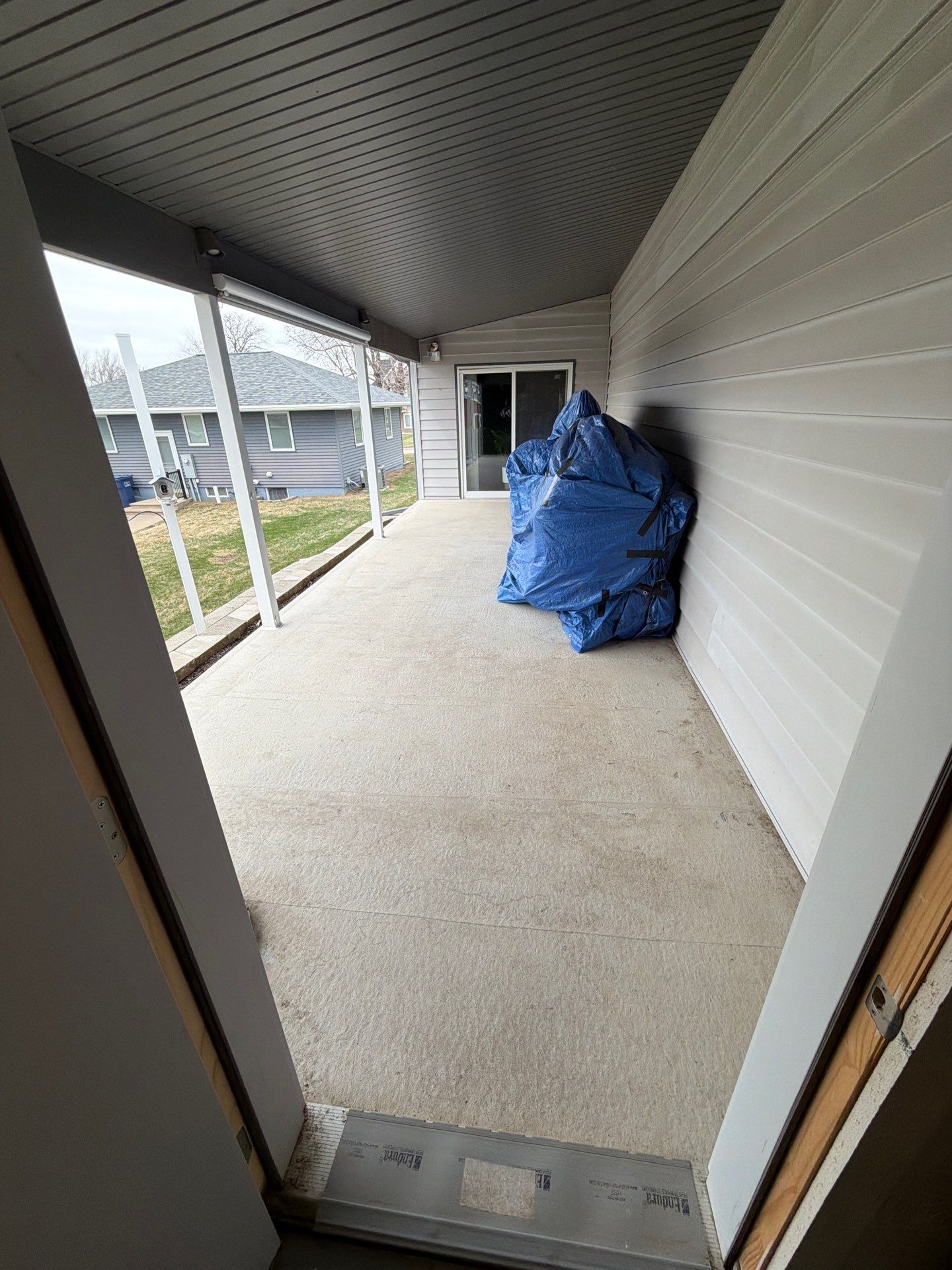 Custom Grey Flake Epoxy Garage Floor Installation in Remsen by Select Painting, Coatings & Garage Cabinets