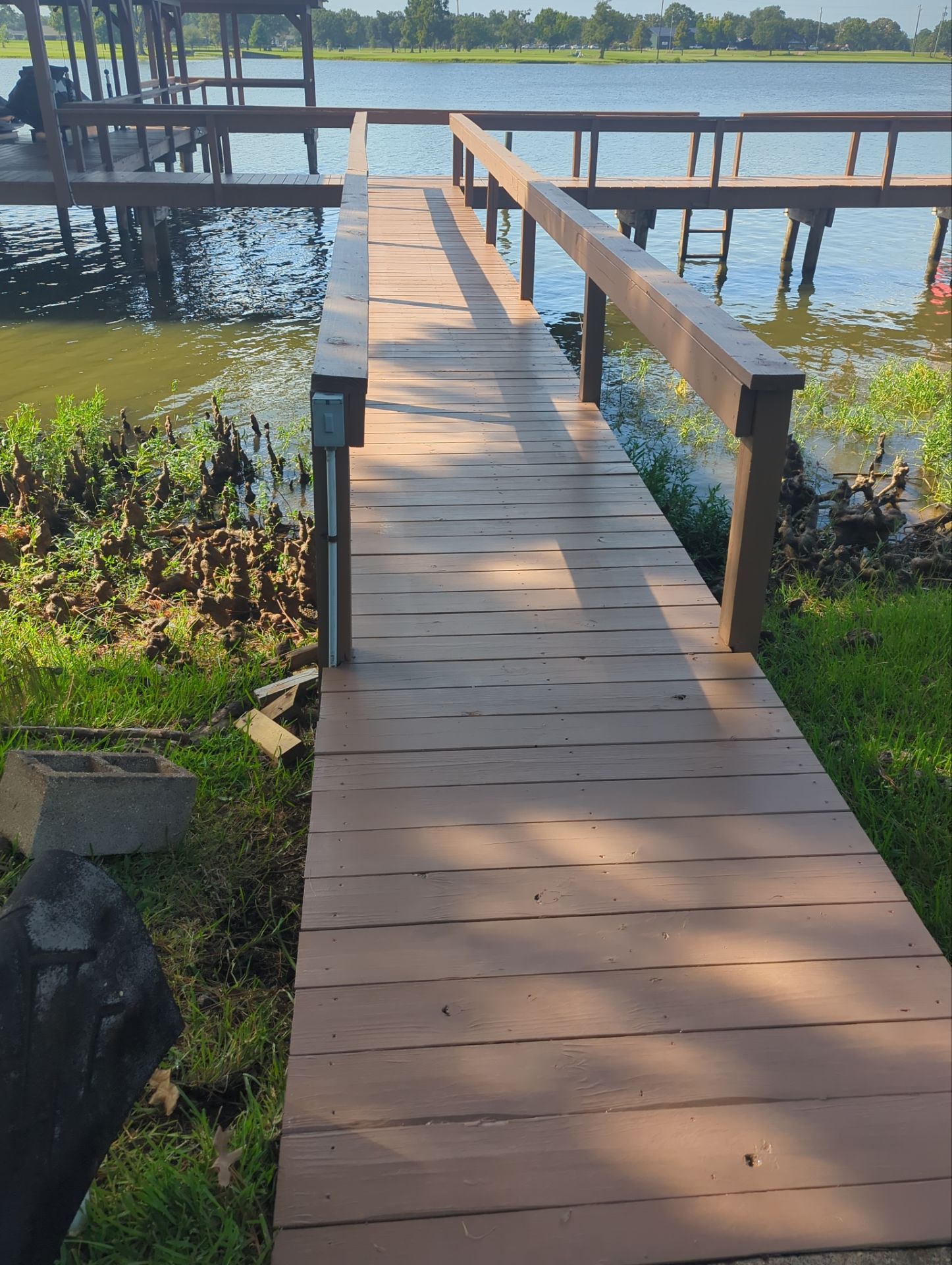 Lake House Deck Restaining in Flint, Texas by Quality Coats Painting