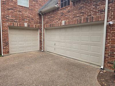 Dark Brown Garage Door Replacement With Decorative Windows in Flower Mound