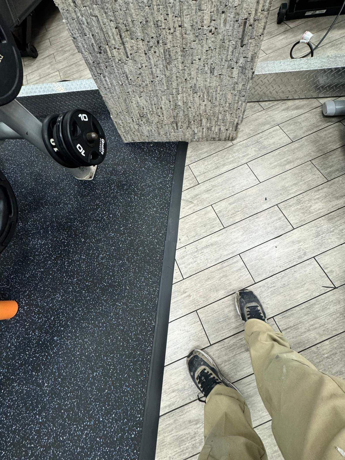 Burke OLF - Wall protection and rubber monster tiles installation by Nova HomeWorks 