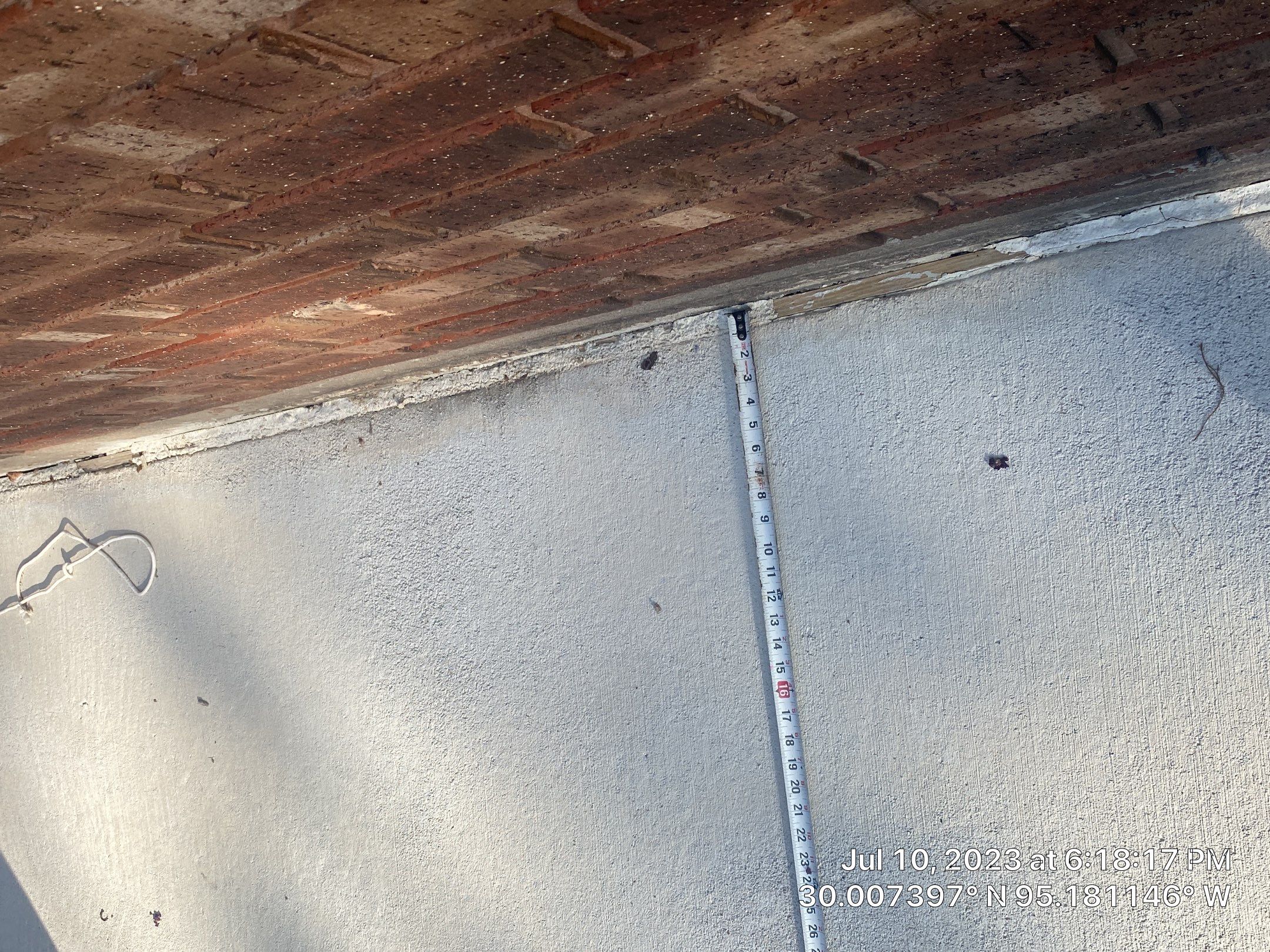 Complete metal driveway gate install with solar powered opener. Metal fence frame with Cedar Pickets by Astro Outdoor Designs 