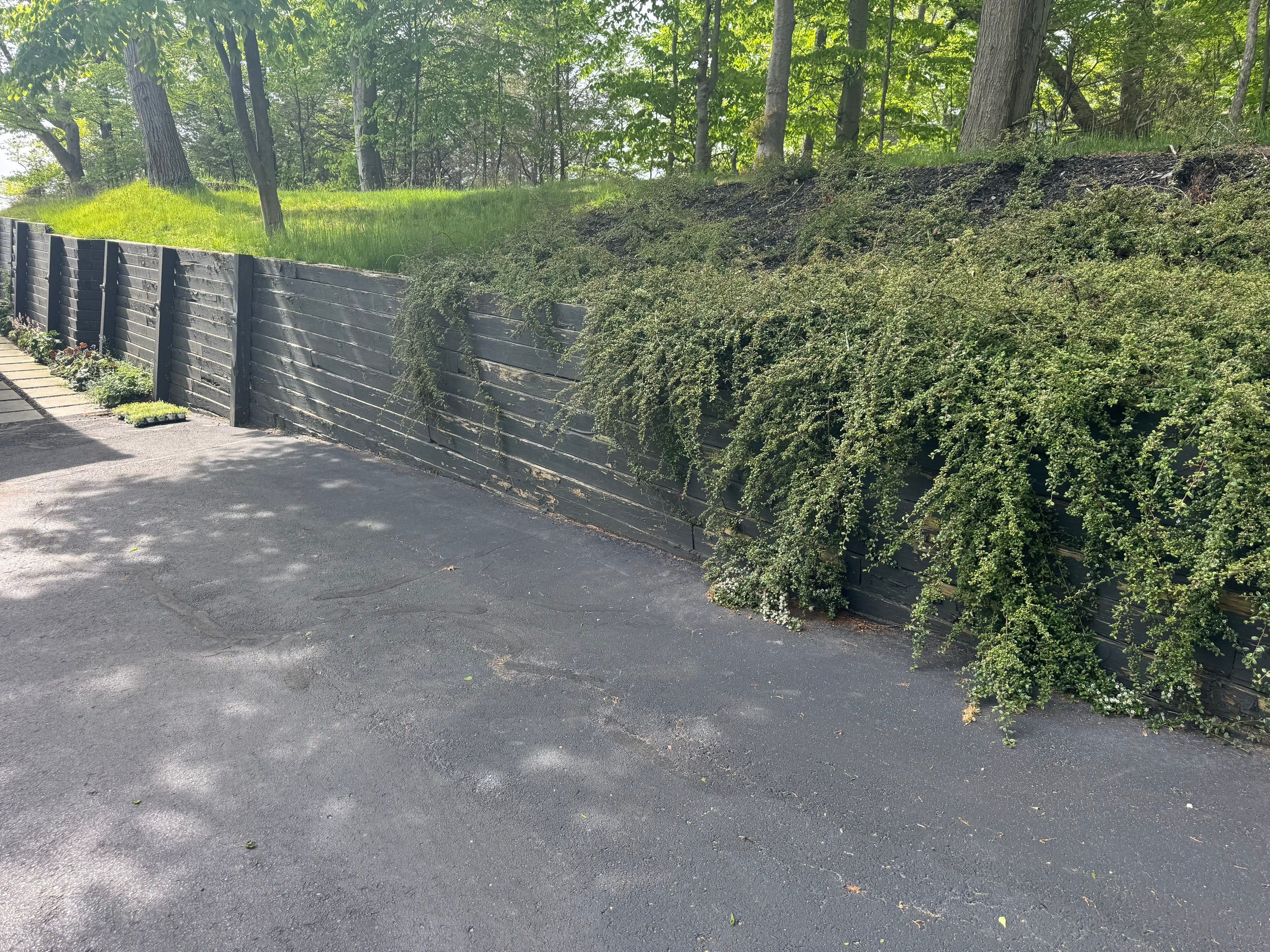 Exterior Retaining Wall Painting | Grand Haven, Michigan by Gordon Painting