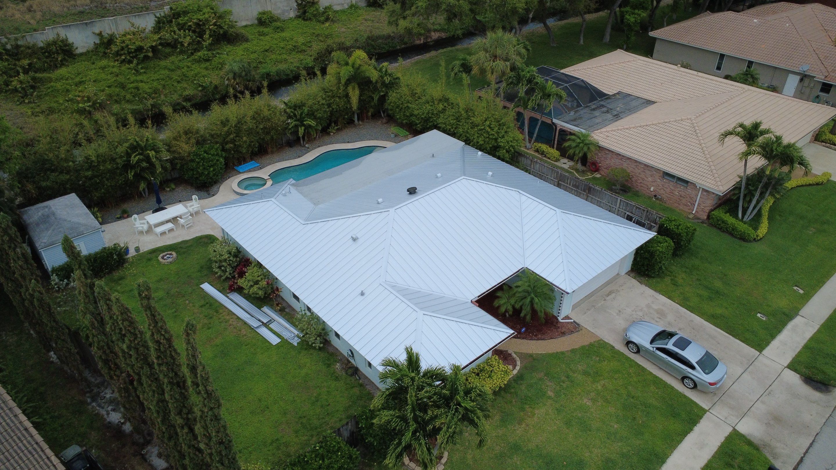 Residential Roofing Installation using 1" Nail strip metal roof by BLUES BROTHERS ROOFING