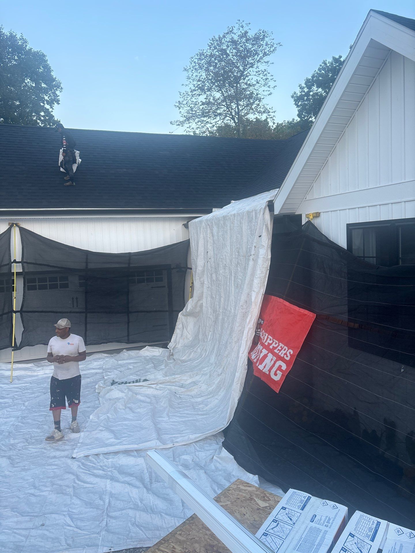 Residential Roofing Installation using GAF Timberline HDZ Charcoal by Rainstoppers Roofing