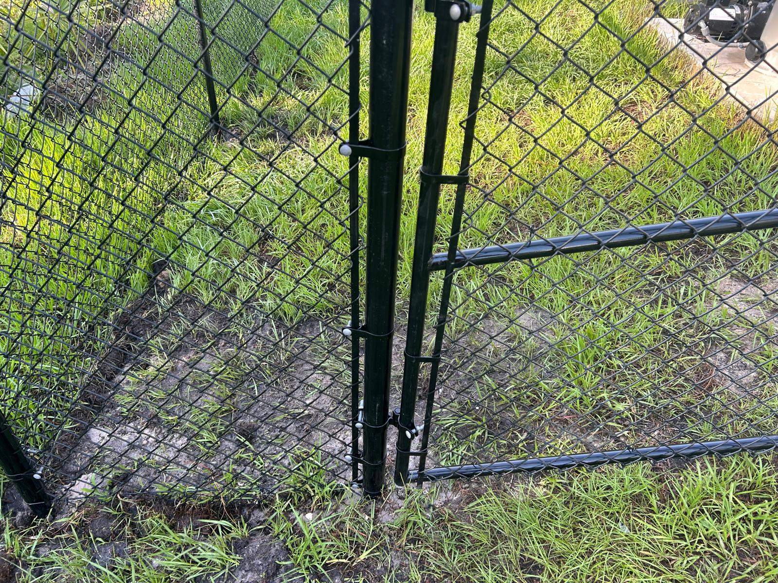 Residential Black Vinyl-Coated Chain Link Fence in Port Charlotte by True Fence LLC