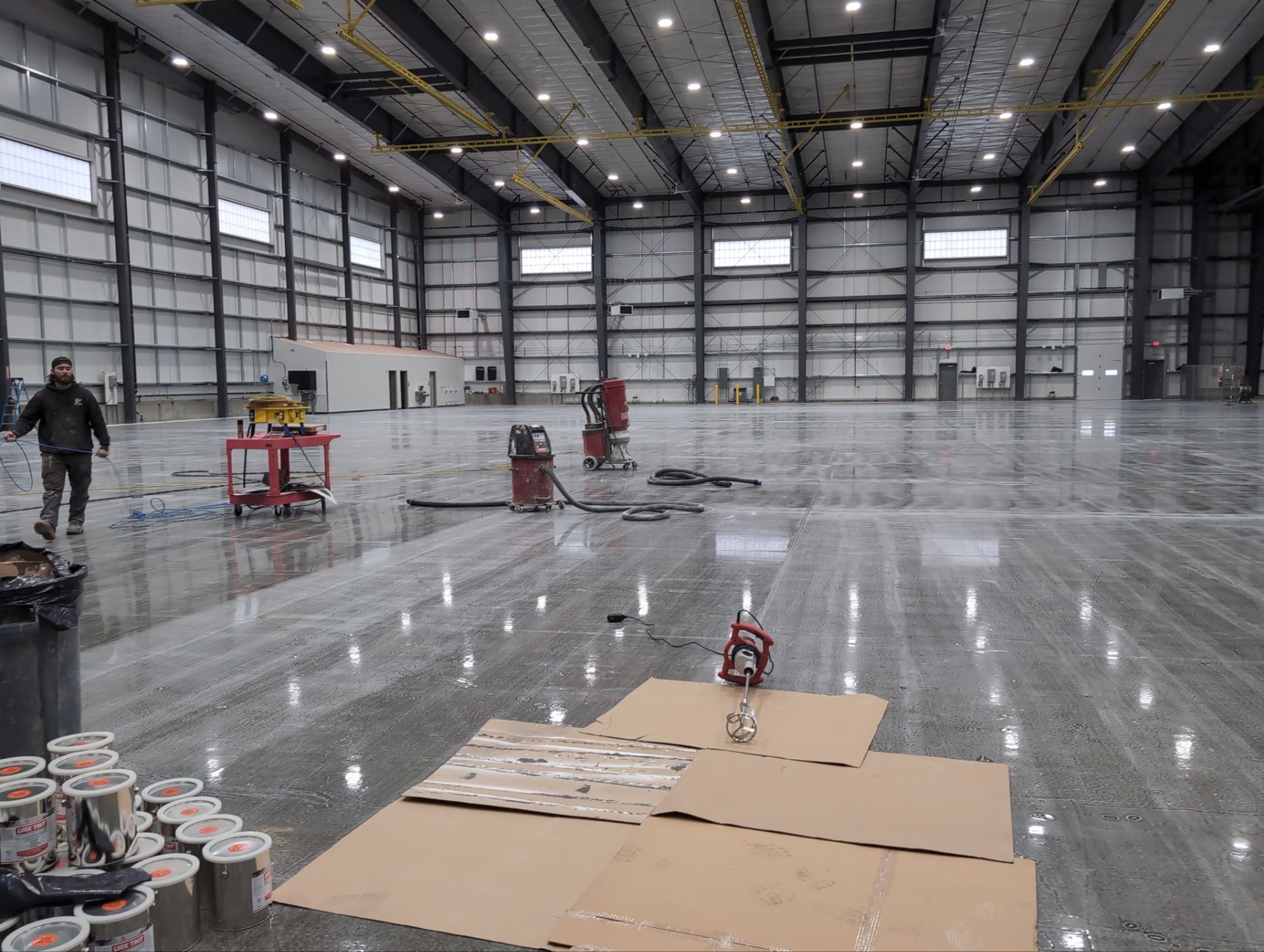 Airplane Hanger using Light Grey Commercial Penntek Epoxy by Croc Coatings, LLC