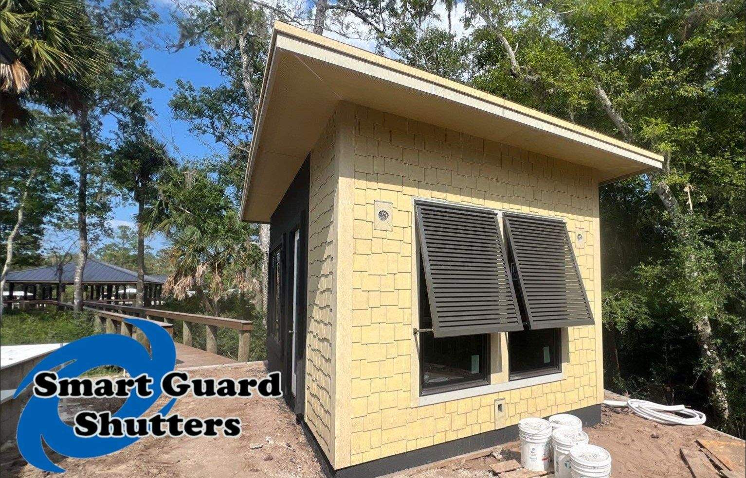 Decorative Shutters in Umbra Grey by Smart Guard Shutters