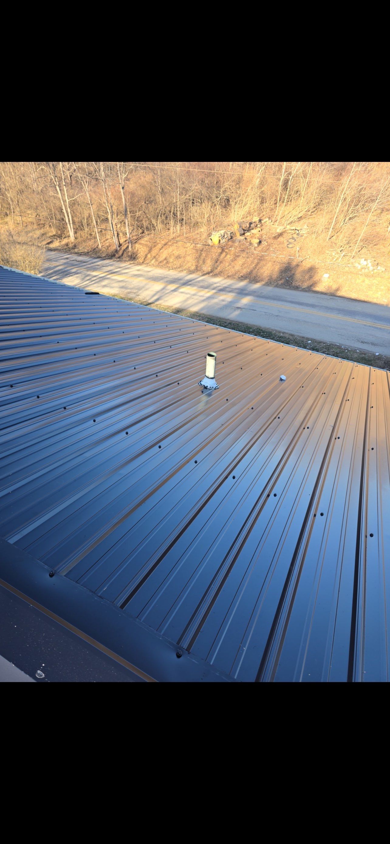 Residential Roofing Installation using Metal by Rainstoppers Roofing