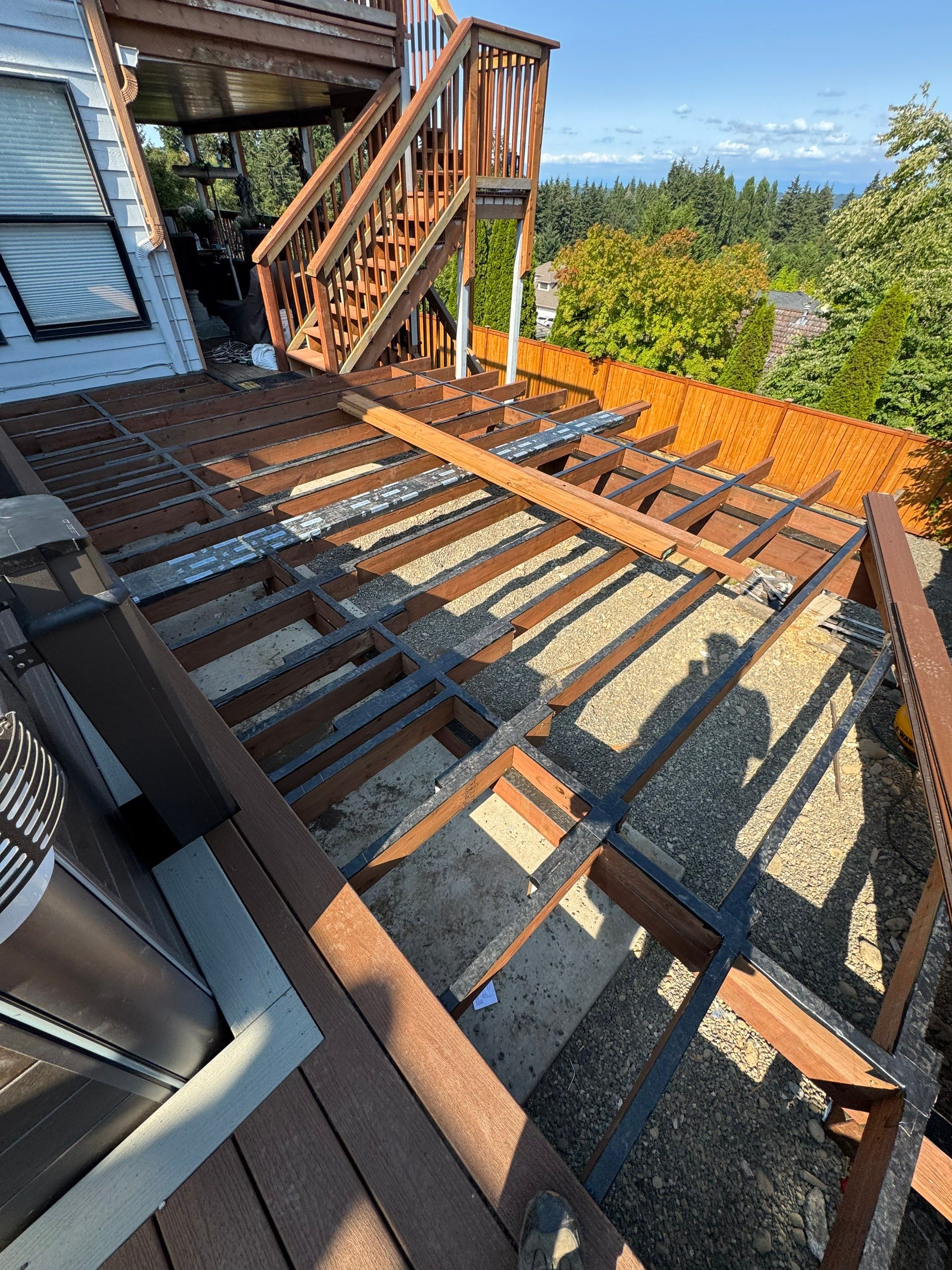 Tacoma Custom Composite Deck and Hot Tub Surround with Retaining Wall by Emerald City Energy 