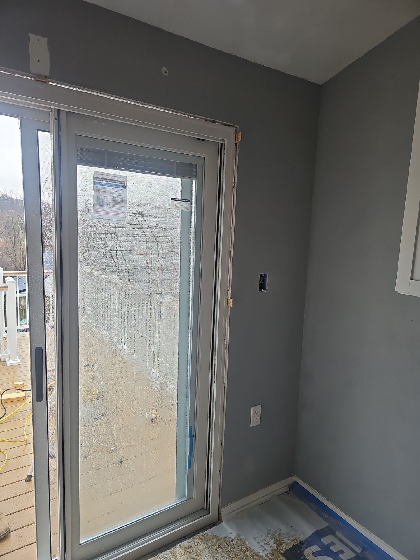 Deck and door by Cousins Roofing Siding & Decks