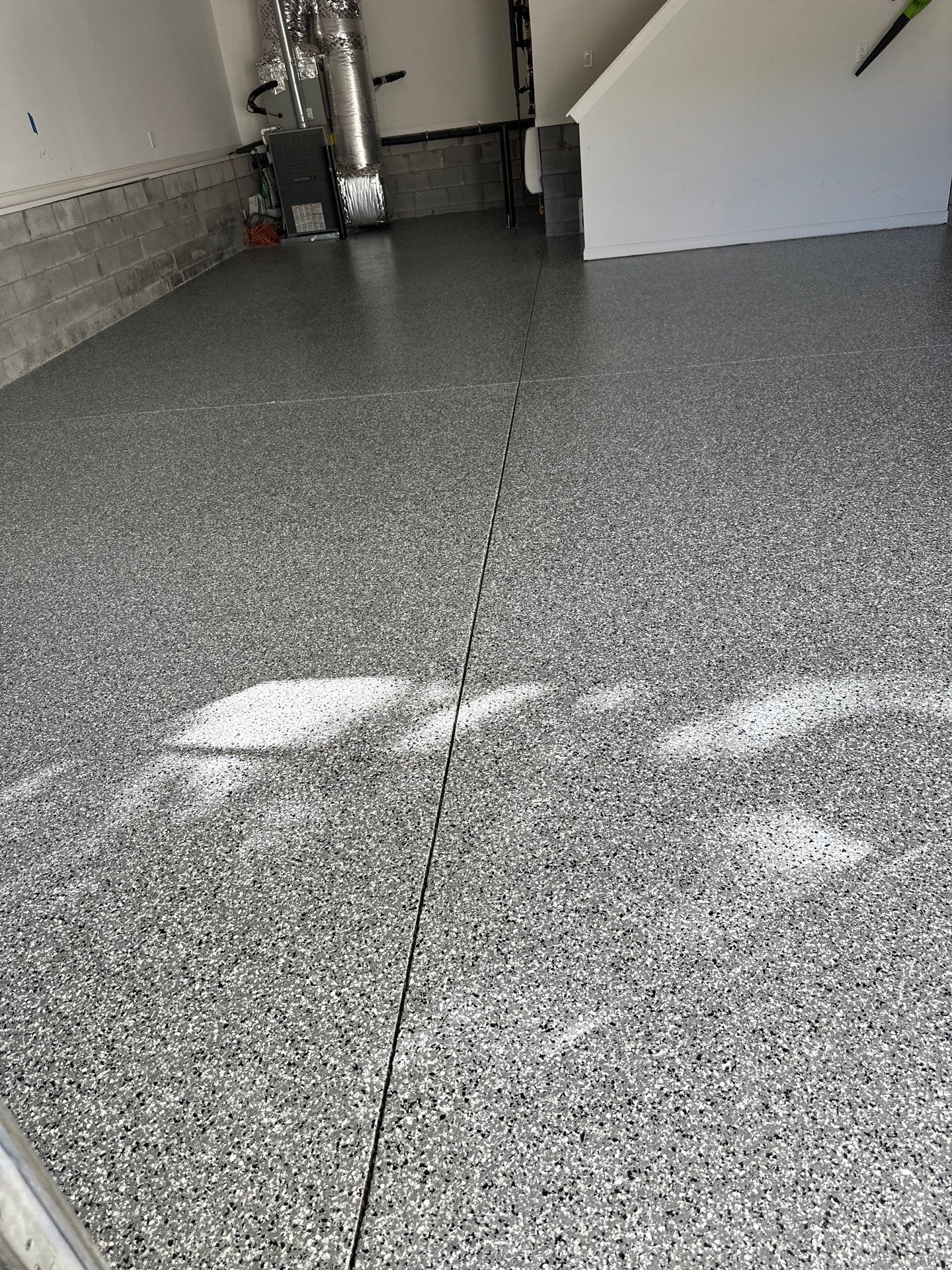 Garage Floor Coating using Wombat by My Garage Floor Guys