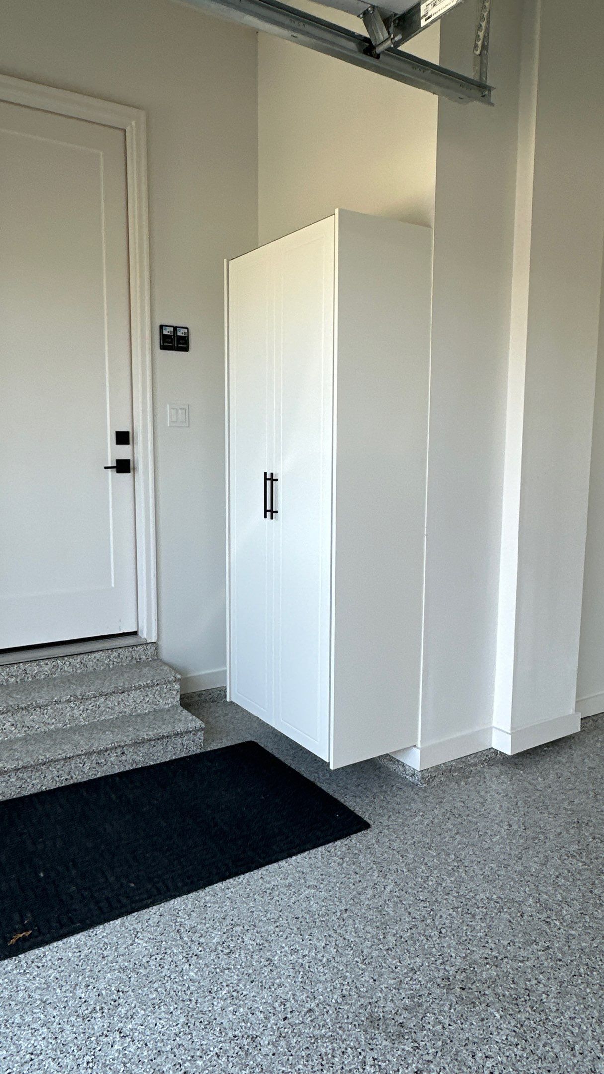 Jon S. transformed his garage with a new floor, slotwall & Cabinets! by Banner Garage