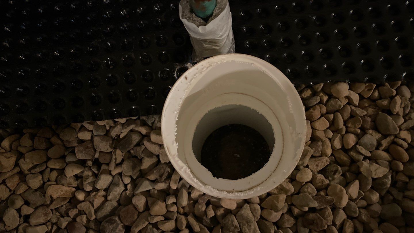 Interior Drain Tile & Sump Pump System in North Minneapolis by Waterproofing Northeast