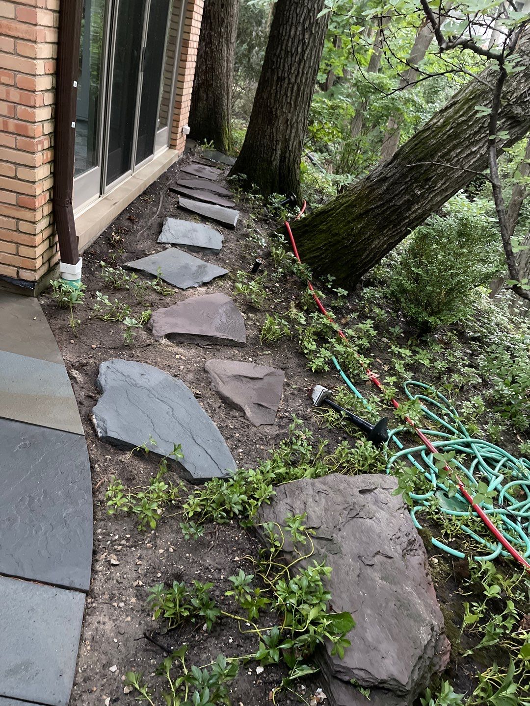 Bluestone patio cleaning by Northern Power Washing LLC.