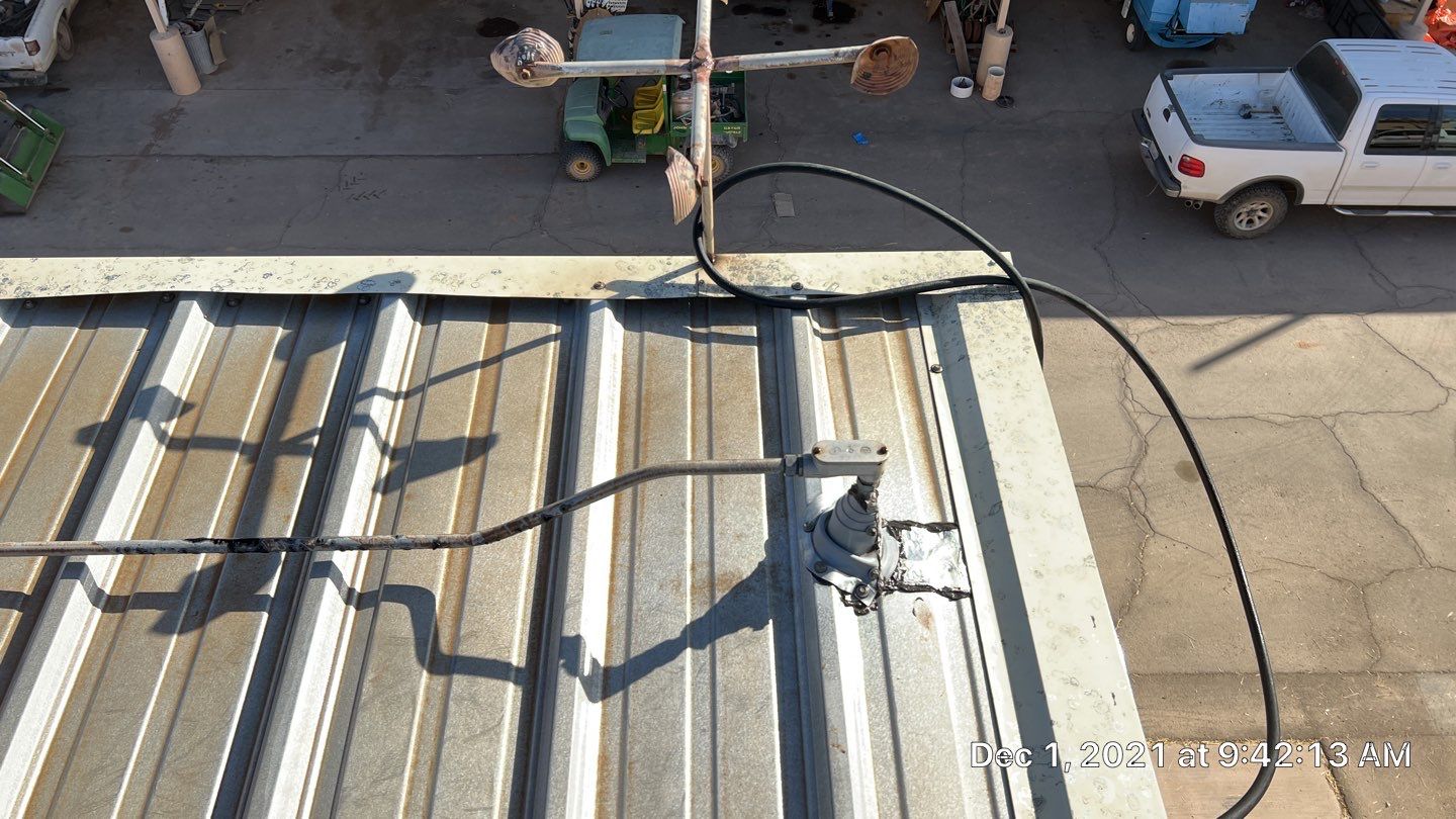 Metal roof restoration on commercial roof using Conklin Benchmark/PUMA XL fabric and coating by Straight Edge Roofing Inc