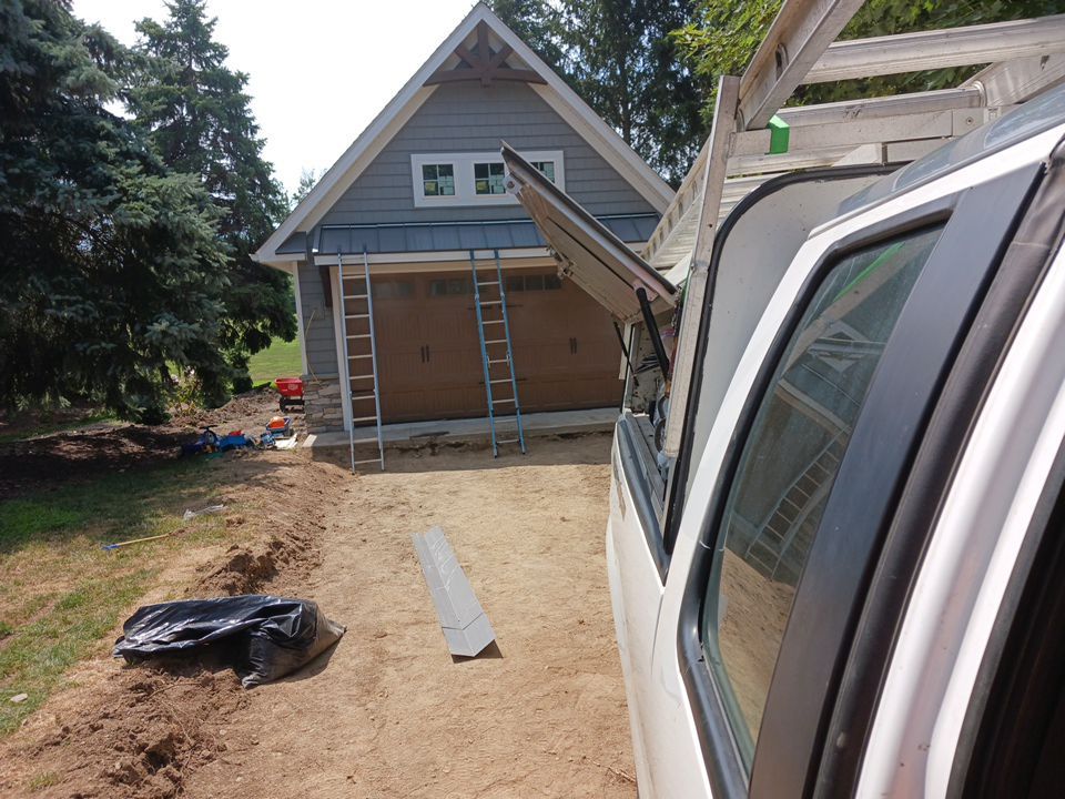 Garage Metal Roof using Standing Seam Metal by Absolute Roofing and Construction