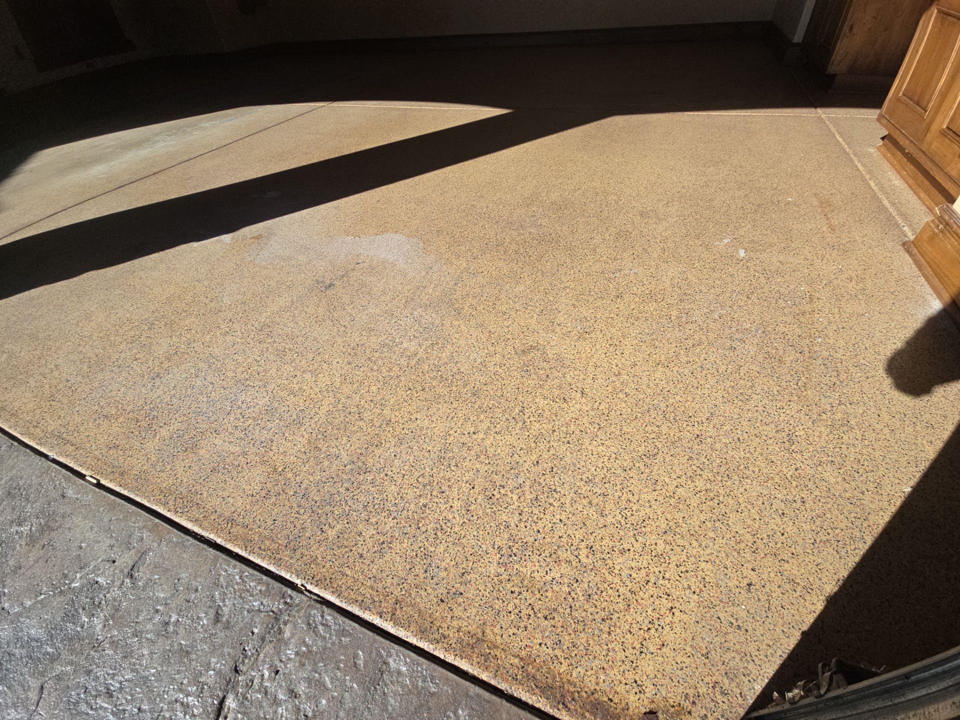 Garage Transformation using Stone/Marble Hybrid by Croc Coatings, LLC