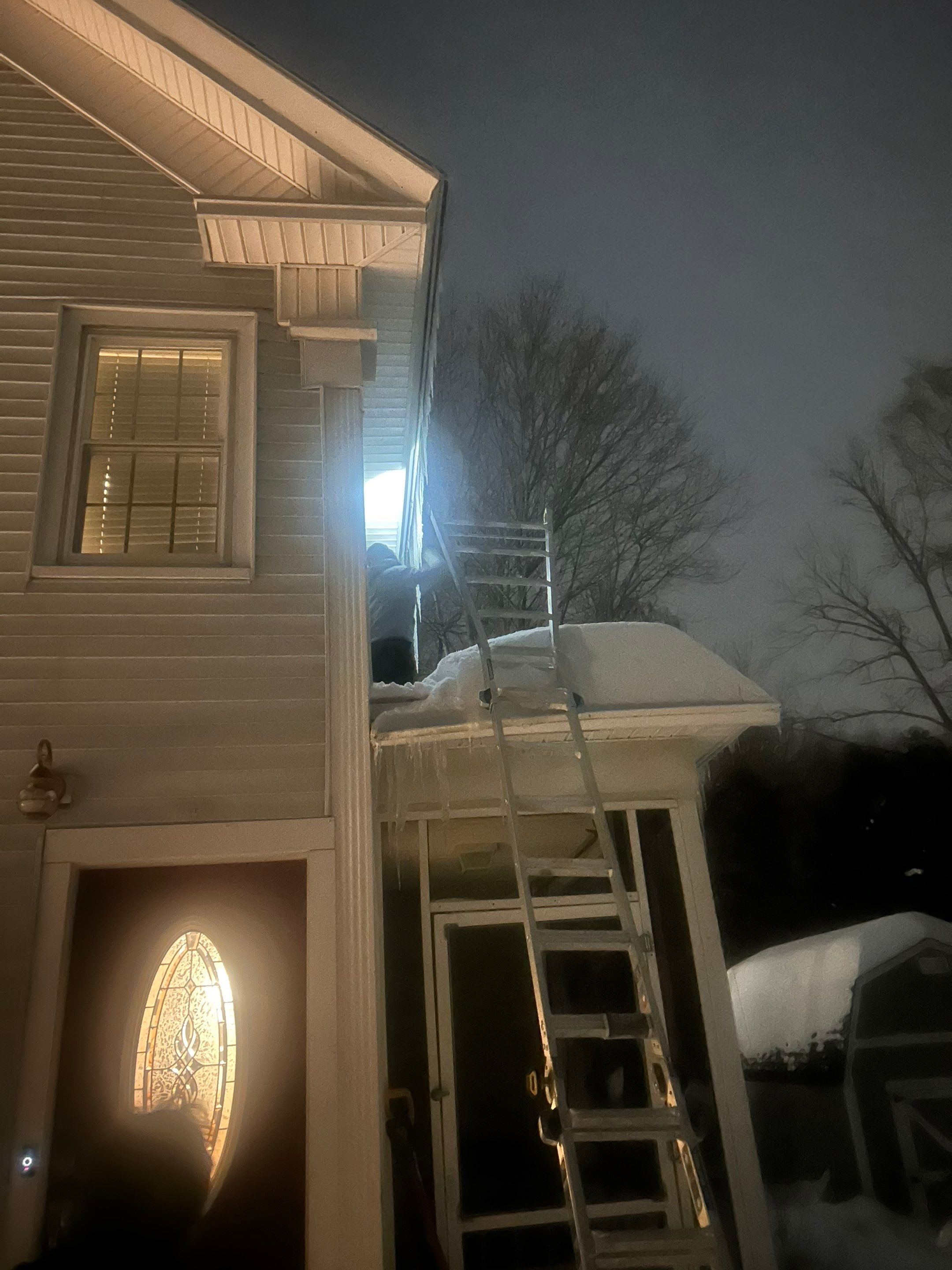 Snow and Ice dam removal by Mighty Dog Roofing of Greater Middlesex County