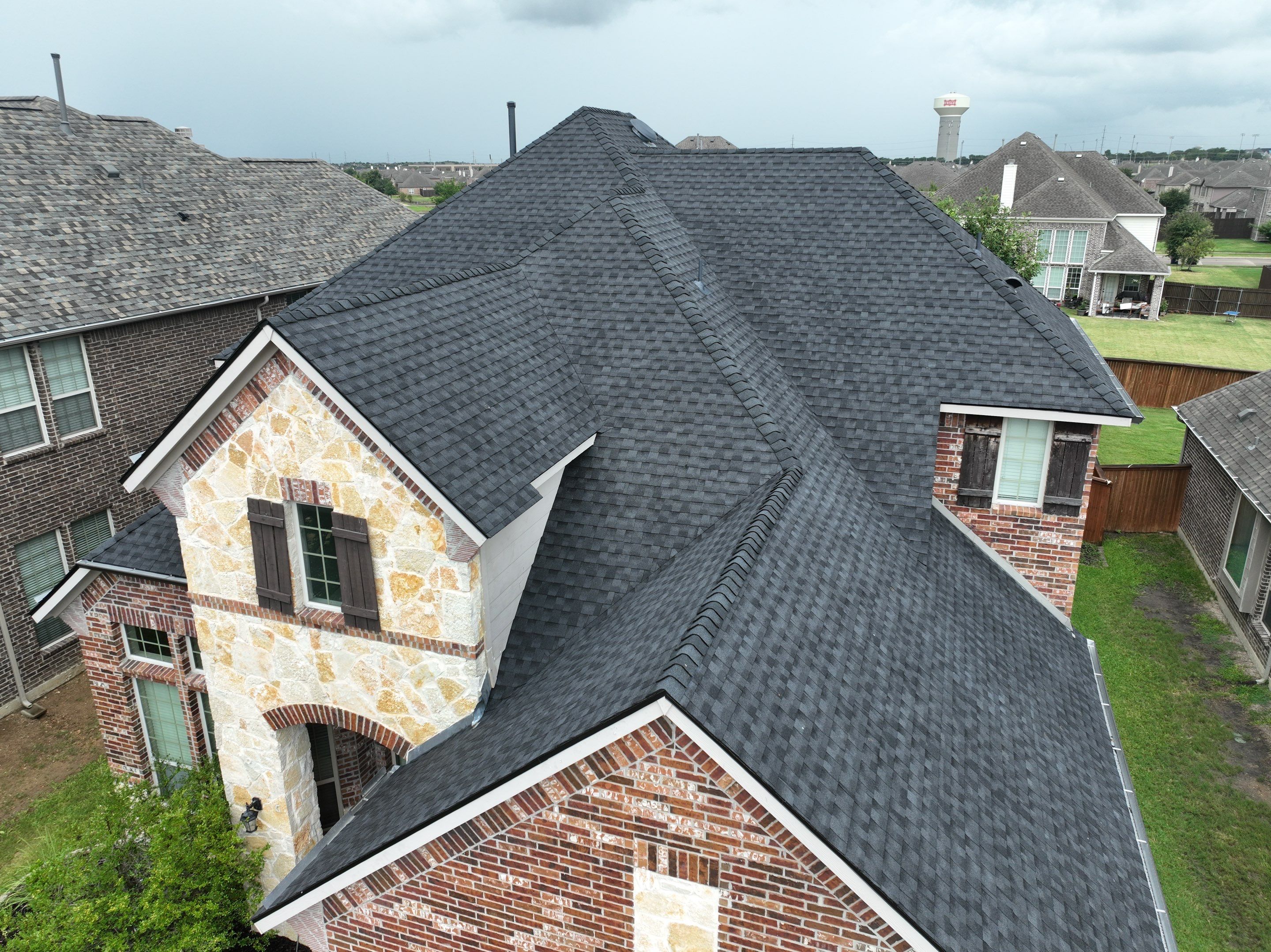 Residential Roofing Installation using GAF Timberline HDZ Charcoal by OneSource Roofing and Restoration