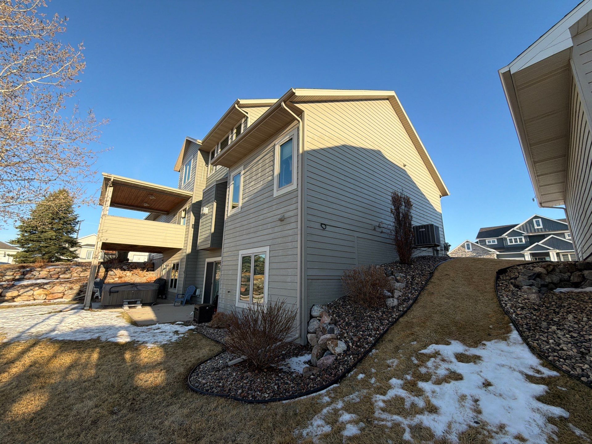 Residential Exterior Painting and Color Update in Sioux Falls by Select Painting, Coatings & Garage Cabinets