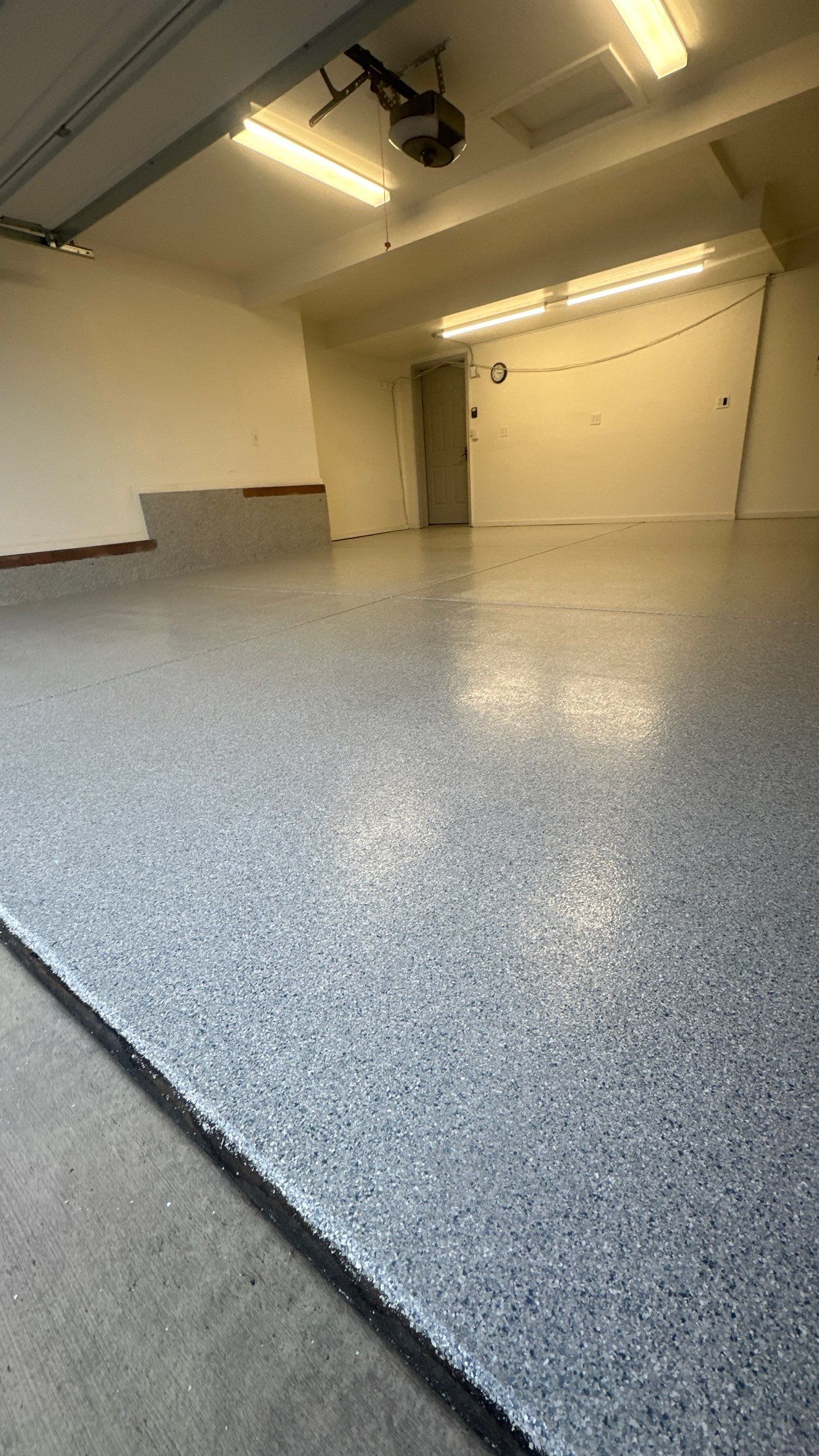 Garage Transformation using 1/8 Tidal Wave by Croc Coatings, LLC
