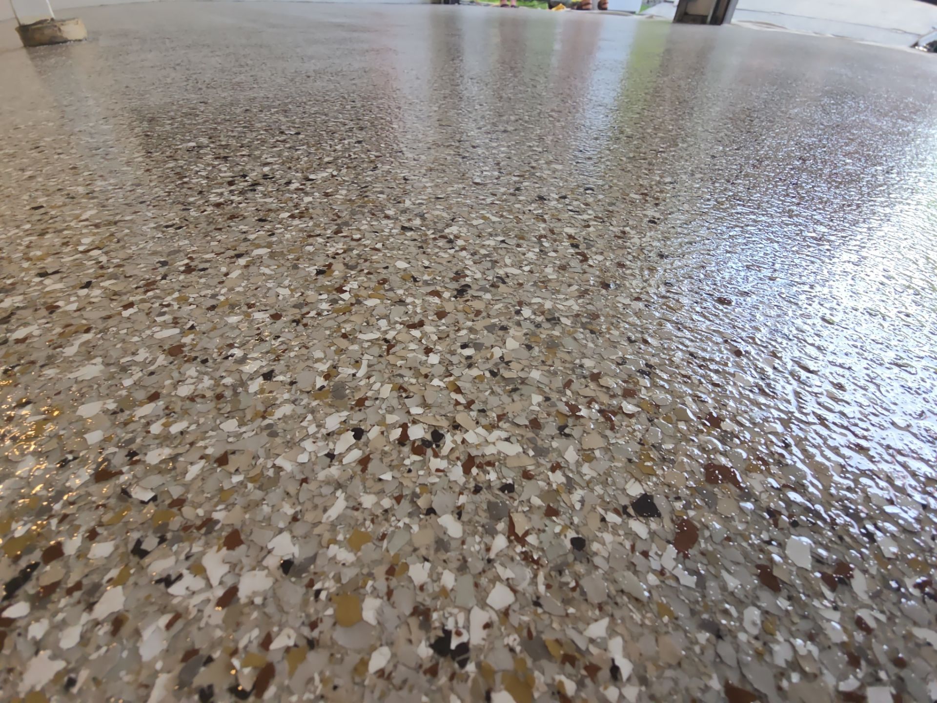 Pullman Garage Floor Transformation with Pebble Beach Flake Coating by Croc Coatings, LLC