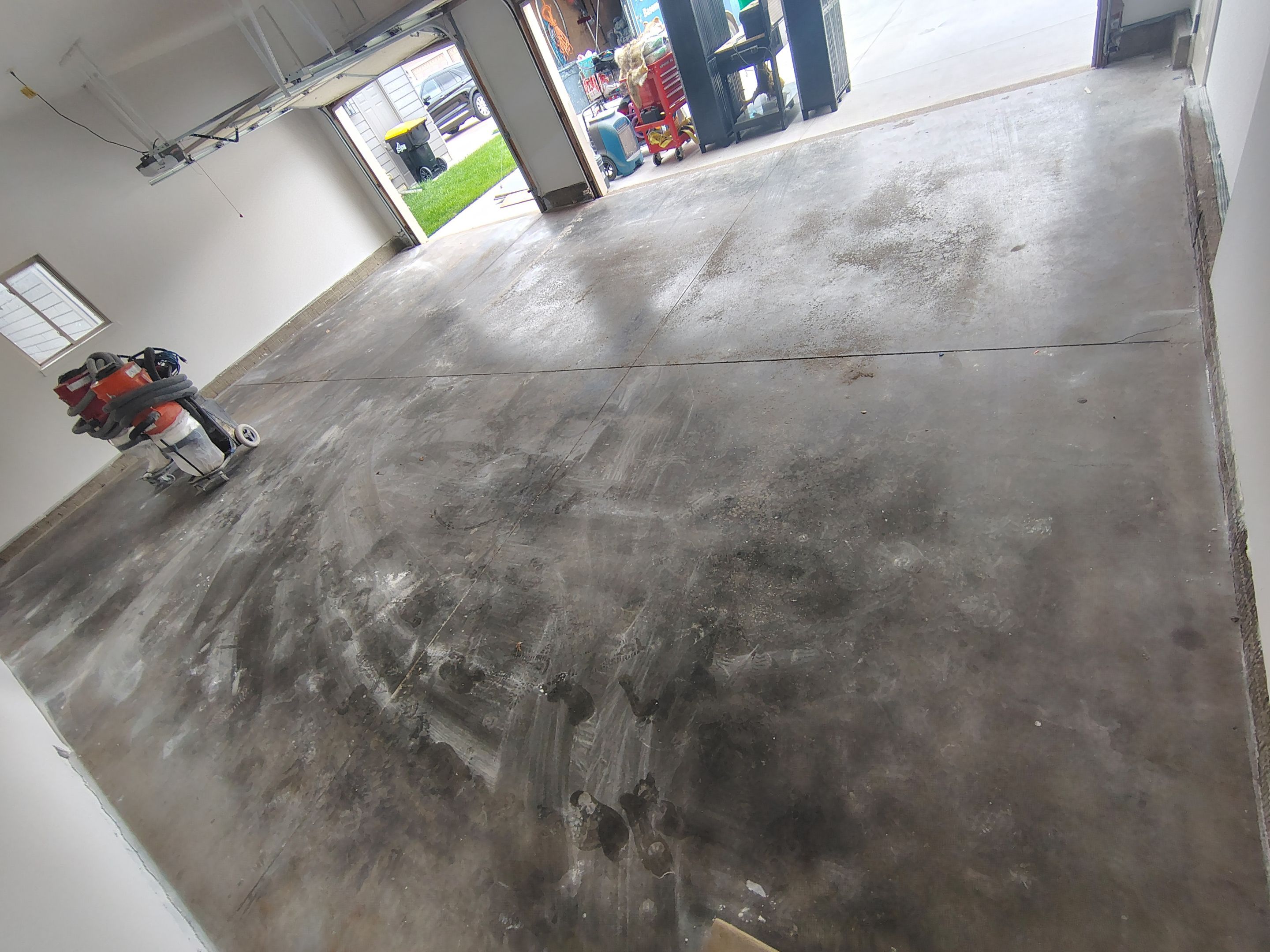 Custom Grey Speckled Epoxy Floor Coating for Sioux Falls Garage by Select Painting, Coatings & Garage Cabinets