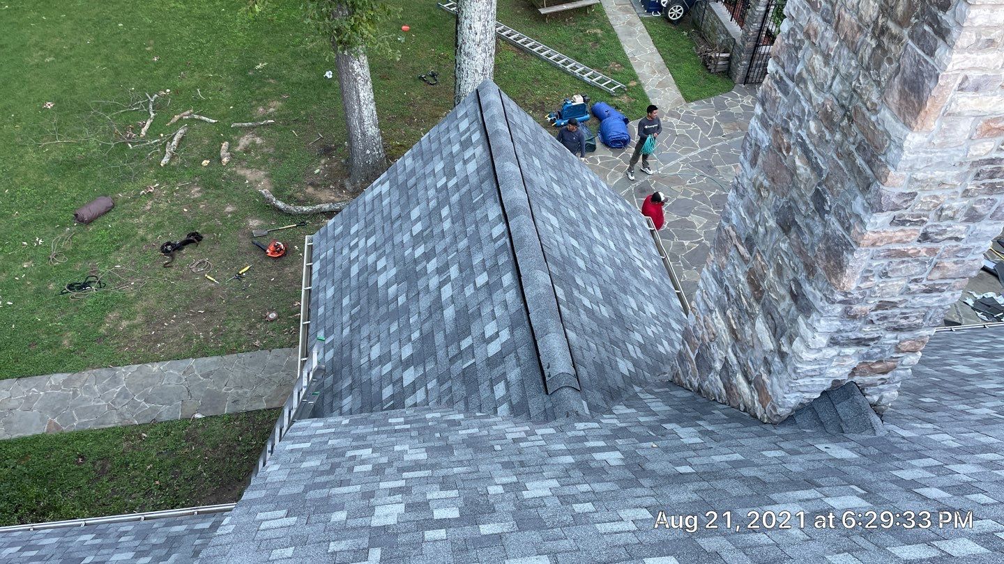 Roof Replacement using IKO Dynasty by American Home Contractors