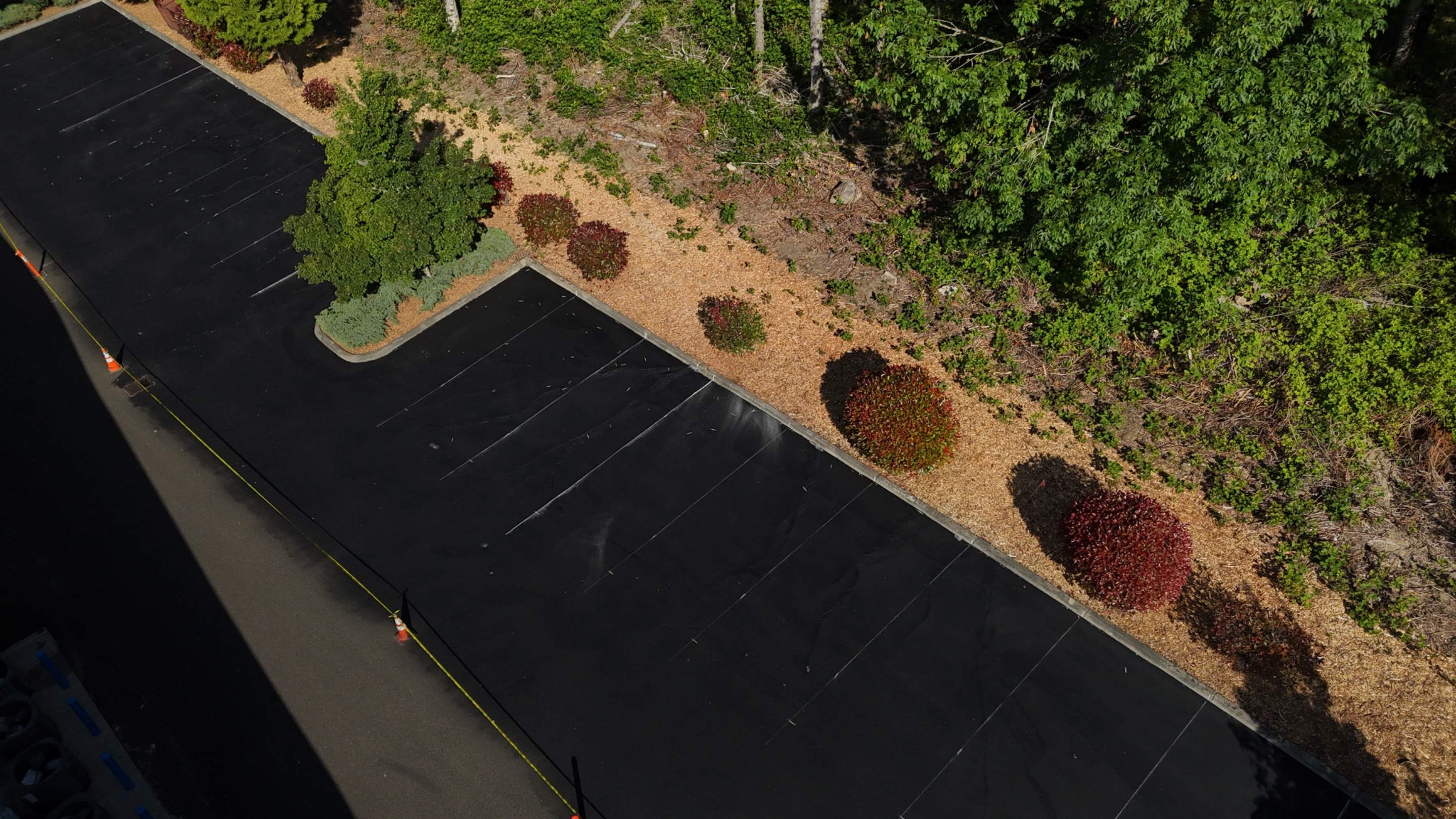 King Machine Business Parking Lot Sealcoat Overlay | Mukilteo by Jireh Asphalt & Concrete Inc 