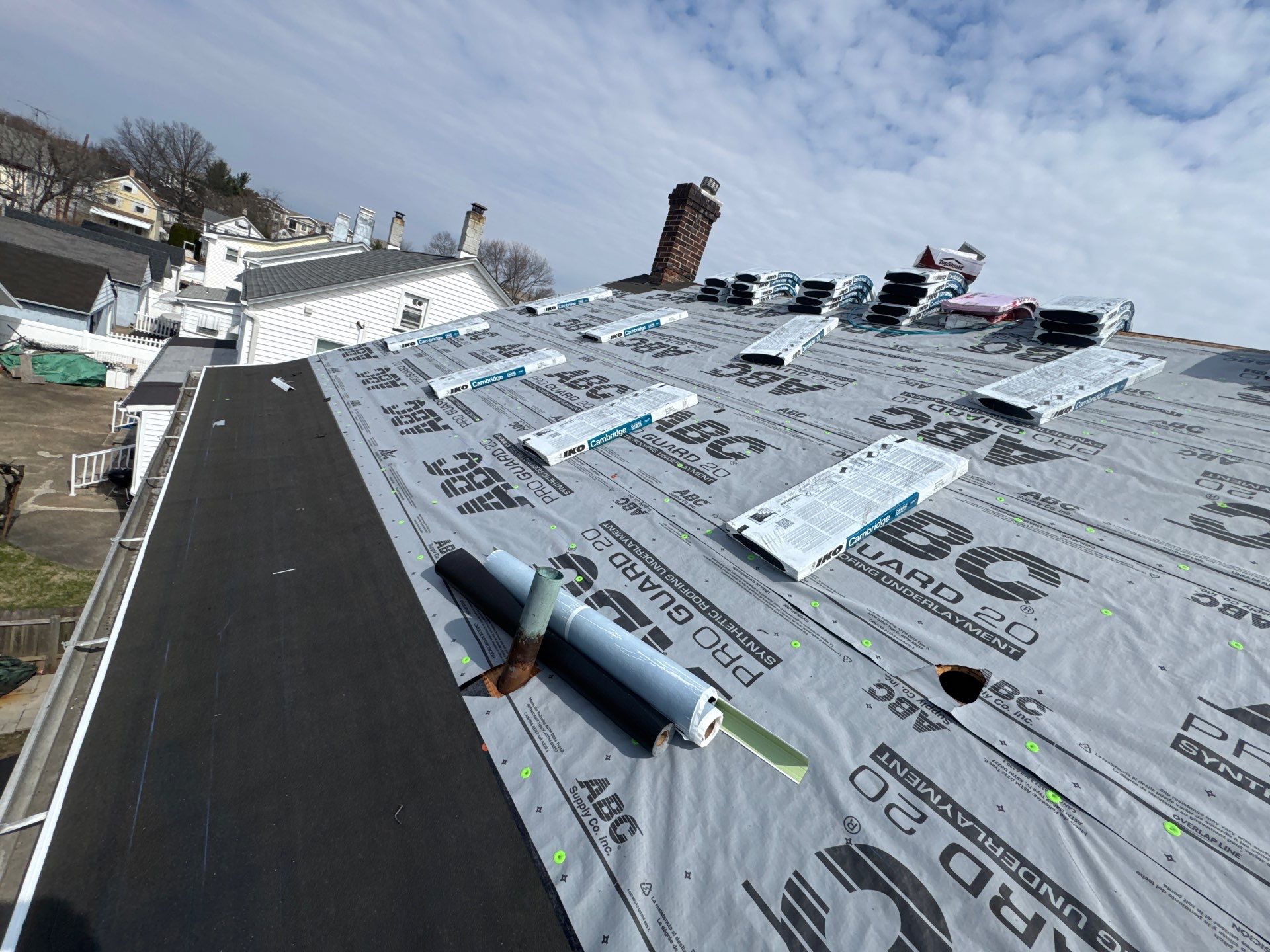 Onyx Black Shingles by Reimagine Roofing
